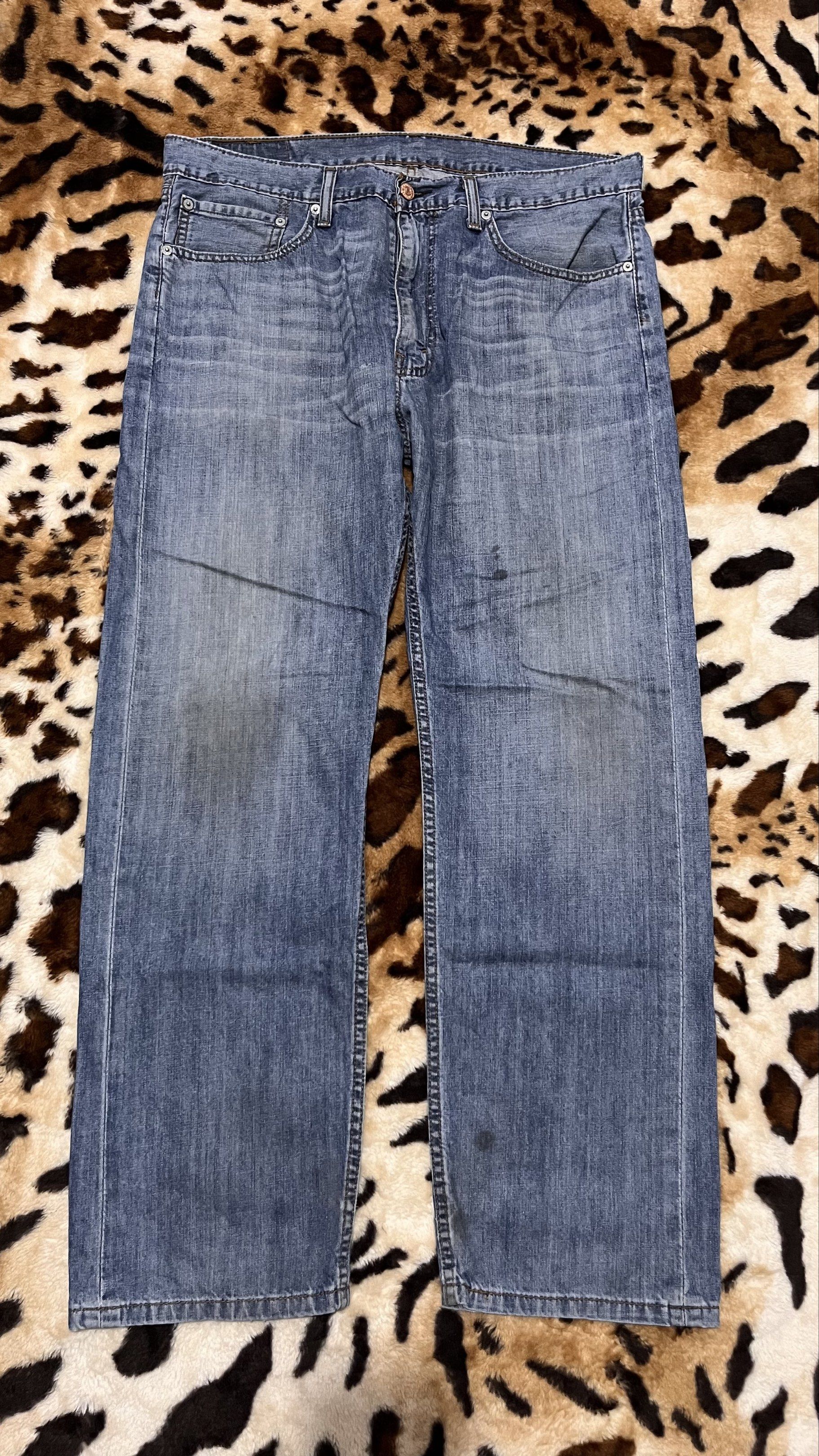Levi's 505 Jeans - W36 L29 (Category: Jeans) located in Cabuyao City. Submitted by kisyana (Listing ID 1420442184, Image 2). Description: Authentic Levi's 505 jeans in a classic blue wash. Features a button fly and the iconic Levi's red tab. The jeans have a straight leg fit. Size is W36 L29. There are some signs of wear, including some marks and wear on the hems..