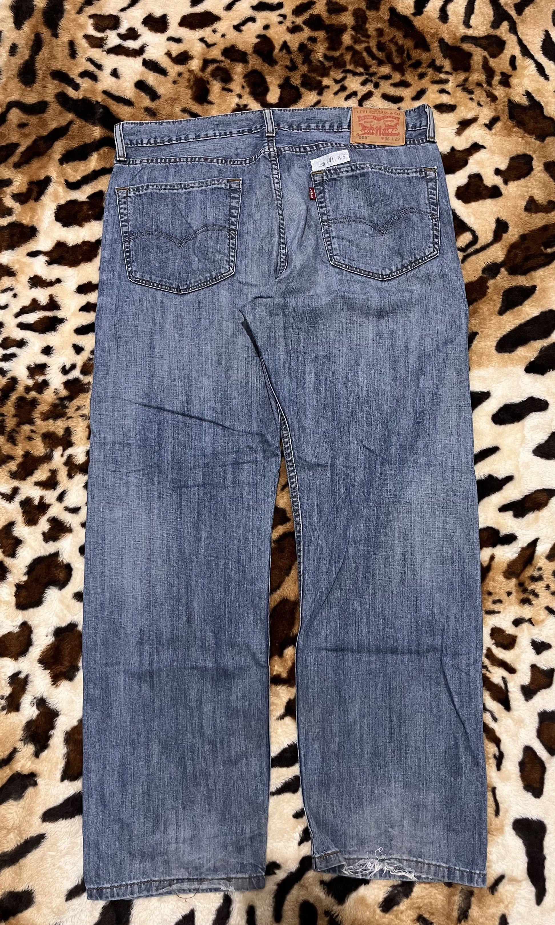 Levi's 505 Jeans - W36 L29 (Category: Jeans) located in Cabuyao City. Submitted by kisyana (Listing ID 1420442184, Image 1). Description: Authentic Levi's 505 jeans in a classic blue wash. Features a button fly and the iconic Levi's red tab. The jeans have a straight leg fit. Size is W36 L29. There are some signs of wear, including some marks and wear on the hems..