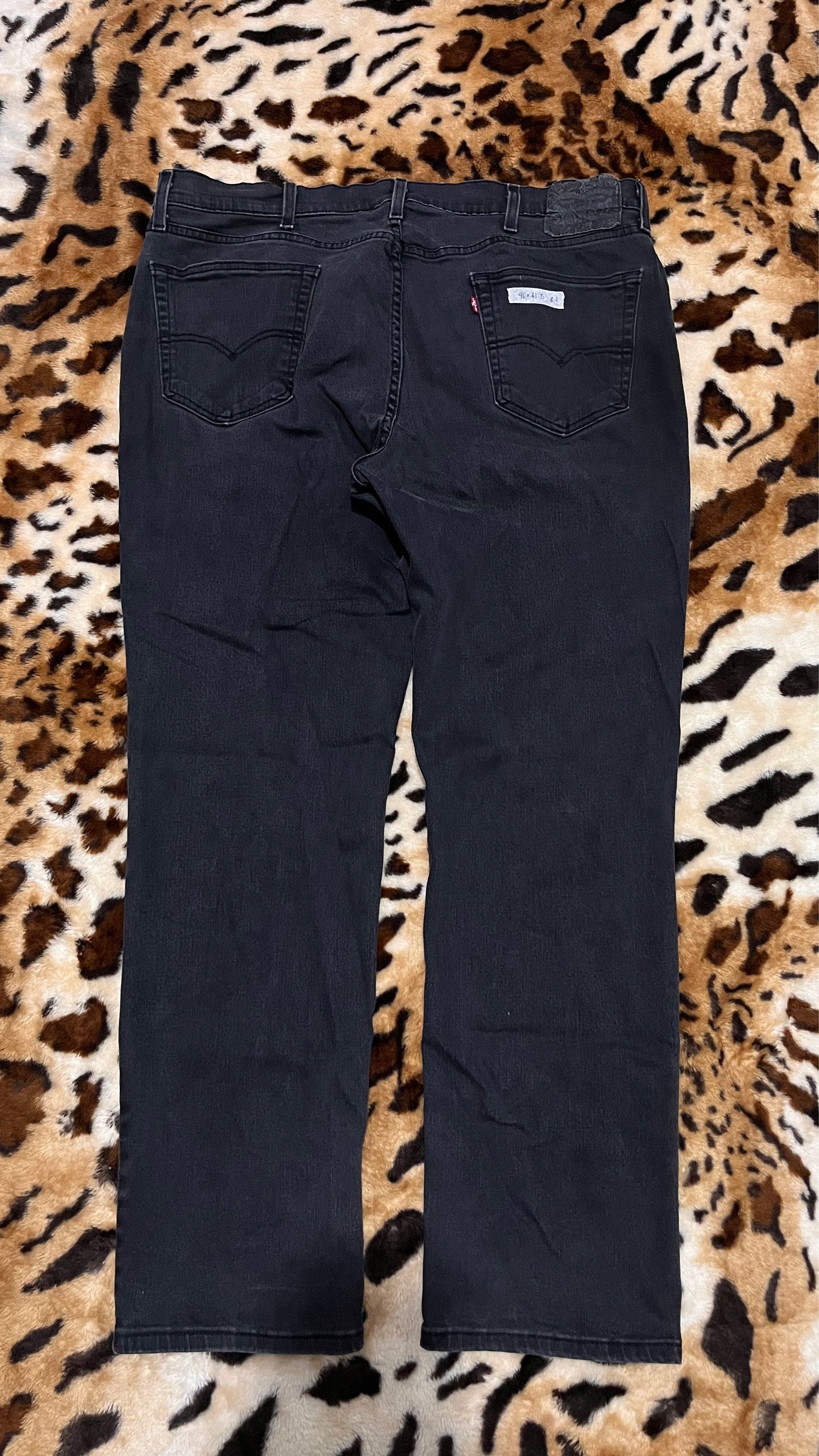 Levi's 505 Regular Fit Jeans (Category: Jeans) located in Cabuyao City. Submitted by kisyana (Listing ID 1420440381, Image 1). Description: Classic Levi's 505 regular fit jeans in black. Features a zip fly, classic five-pocket design, and the iconic Levi's red tab on the back pocket. The jeans have a straight leg and a comfortable fit. The size is 40x41.5. Made with durable denim, these jeans are perfect for everyday wear..