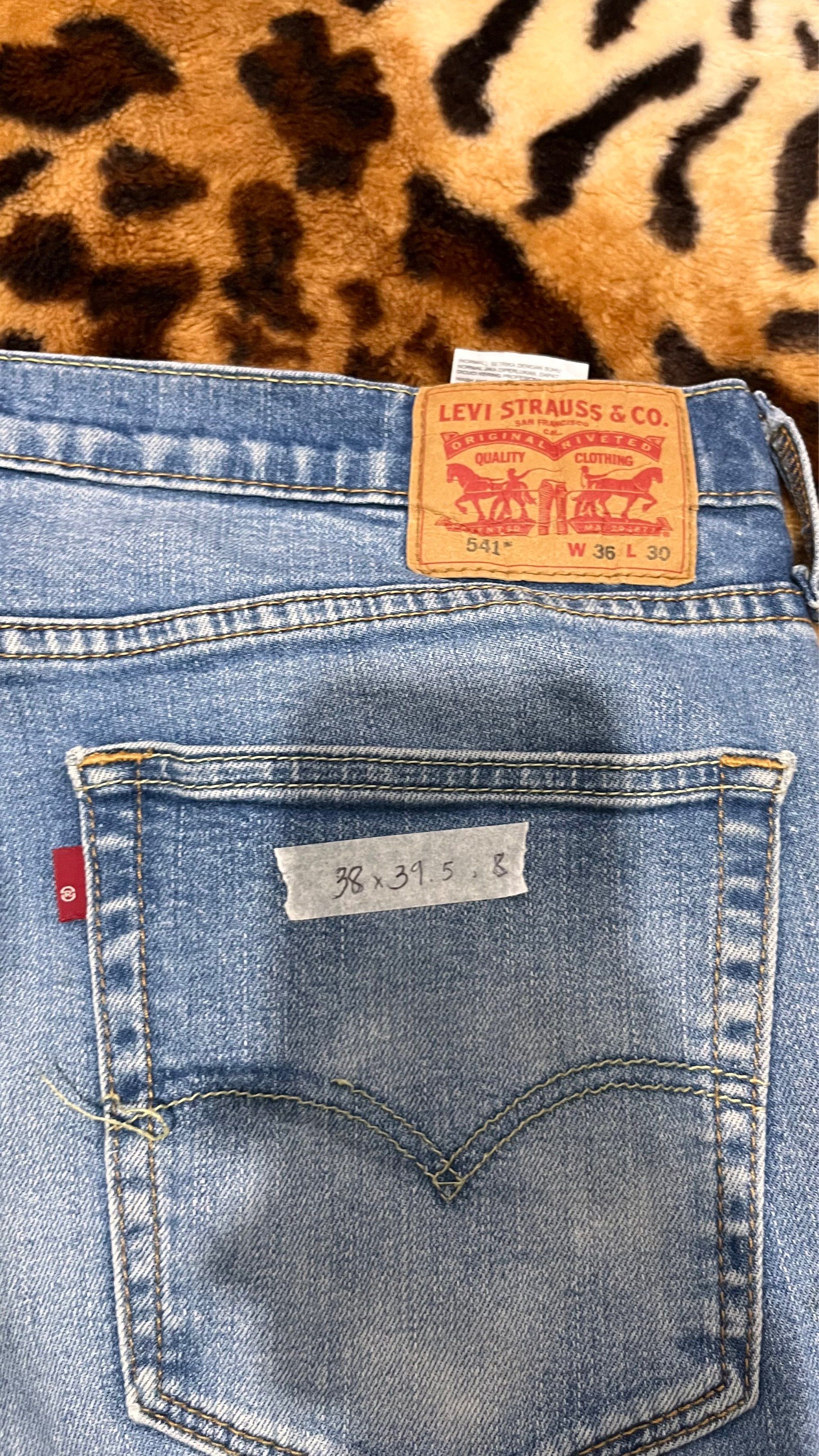 Levi's 541 Athletic Fit Jeans (Category: Jeans) located in Cabuyao City. Submitted by kisyana (Listing ID 1420441407, Image 3). Description: Levi's 541 athletic fit jeans in a classic blue wash. Features a zip fly, five-pocket styling, and the iconic Levi's red tab on the back pocket. The size is W36 L30. Made in Indonesia. The jeans have a comfortable fit and are suitable for everyday wear..