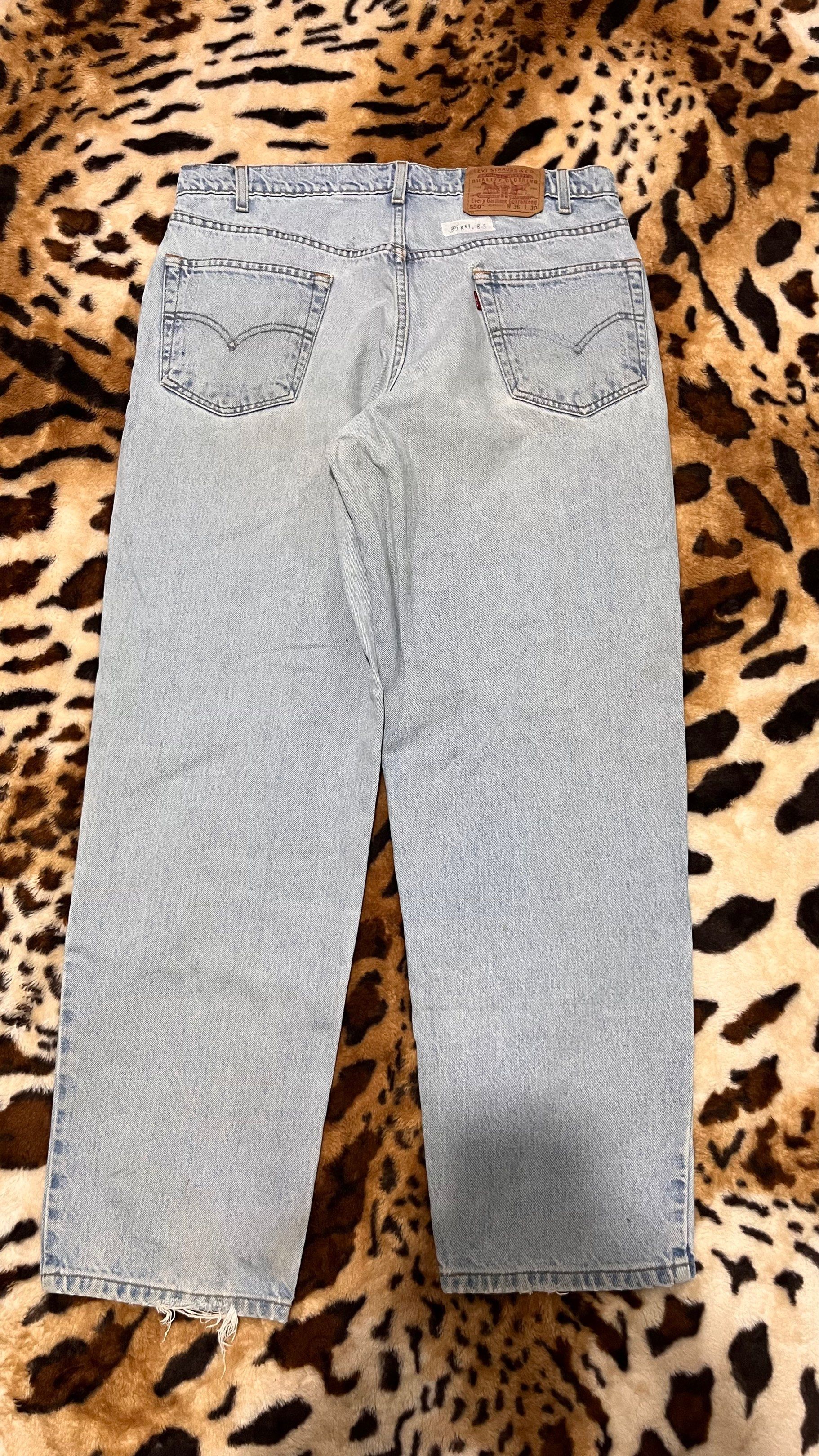 Levi's 550 Relaxed Fit Jeans (Category: Jeans) located in Cabuyao City. Submitted by kisyana (Listing ID 1420442784, Image 1). Description: - Vintage Levi's 550 Jeans - Light wash - Relaxed fit - Size: W36 L30 - Classic five-pocket design - Zip fly with YKK zipper - Signs of wear: fraying at hem, small tear near fly.