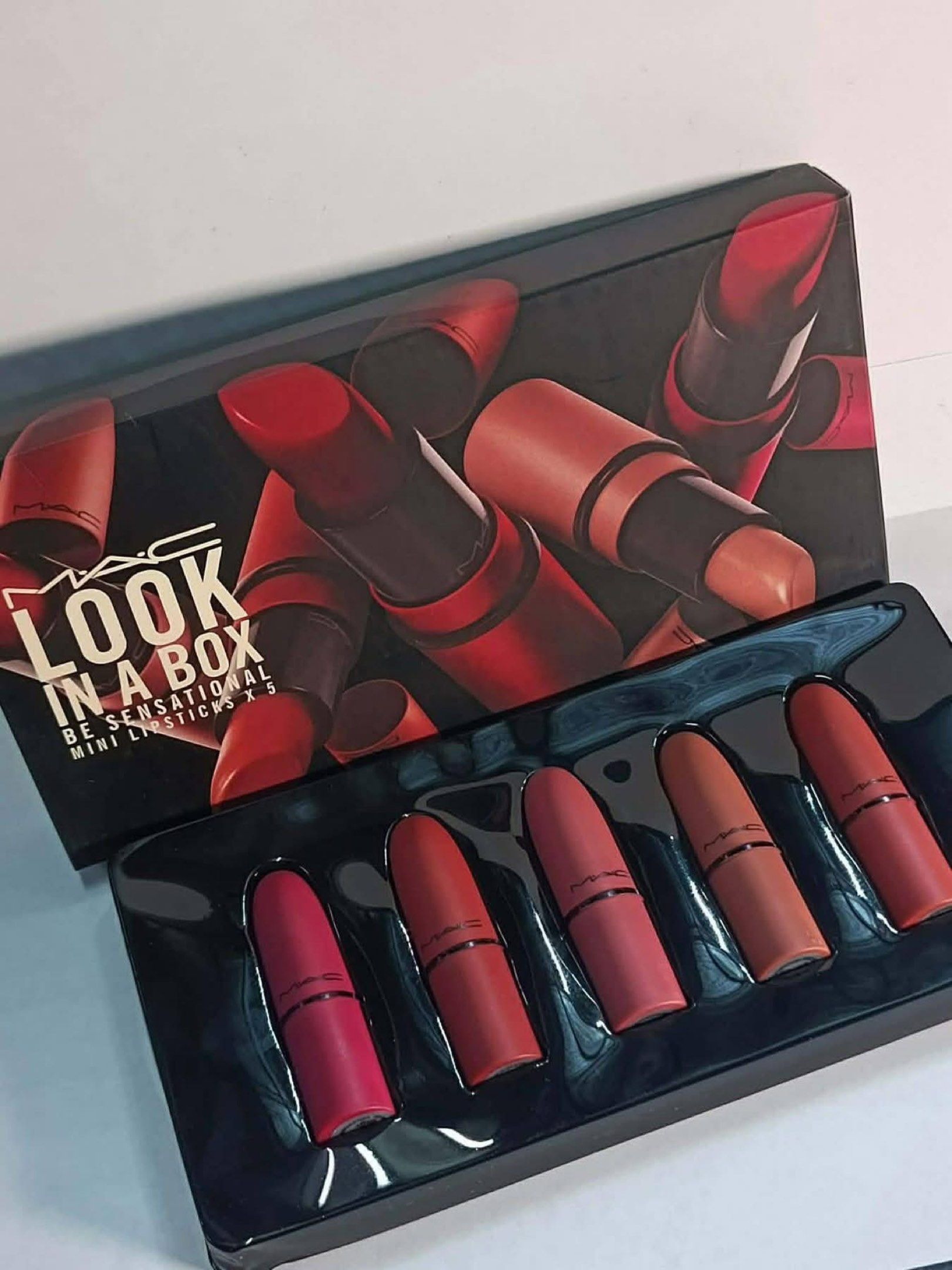 MAC Look in a Box Be Sensational Mini Lipsticks (Category: Makeup) located in Manila. Submitted by bhengtotx (Listing ID 1420432618, Image 2). Description: - MAC Look in a Box Mini Lipstick Set - Includes five mini lipsticks - Assorted shades - Brand new, in original packaging - Original price: ₱2,047.55.