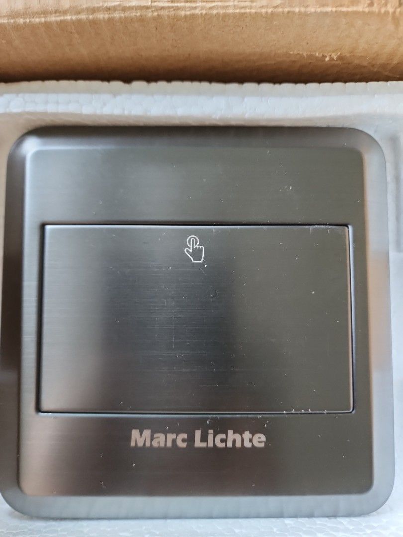 Marc Lichte Universal Power Socket (Category: Electrical, Adaptors & Sockets) located in Singapore. Submitted by yellowdollyear (Listing ID 1420352921, Image 2). Description: Brand new Marc Lichte universal power socket. Features a sleek silver design. The socket is designed to fit multiple plug types. Perfect for home or office use. Comes in original packaging..
