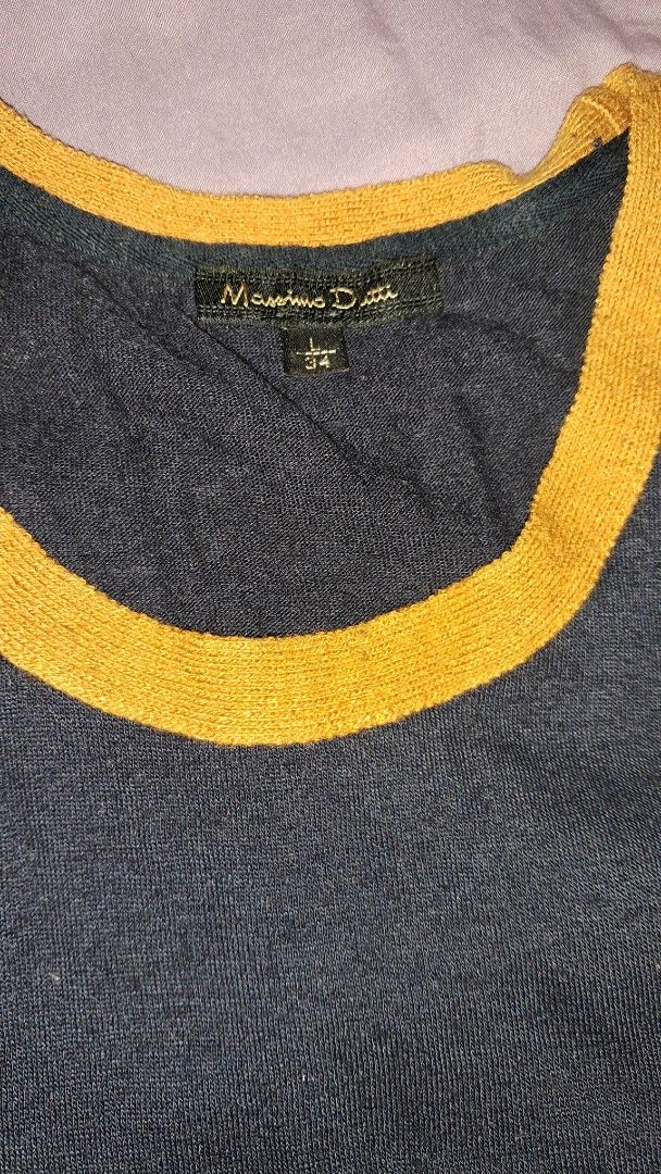 Massimo Dutti Knitted Navy Blue T-shirt (Category: Blouses) located in Cavite. Submitted by naning049 (Listing ID 1420401945, Image 2). Description: - Massimo Dutti T-shirt, orig - Color: Navy blue with yellow trim - Size: L/34 - Features: Short sleeves, chest pocket - Material: Knit fabric -manipis na knitted fixed price.