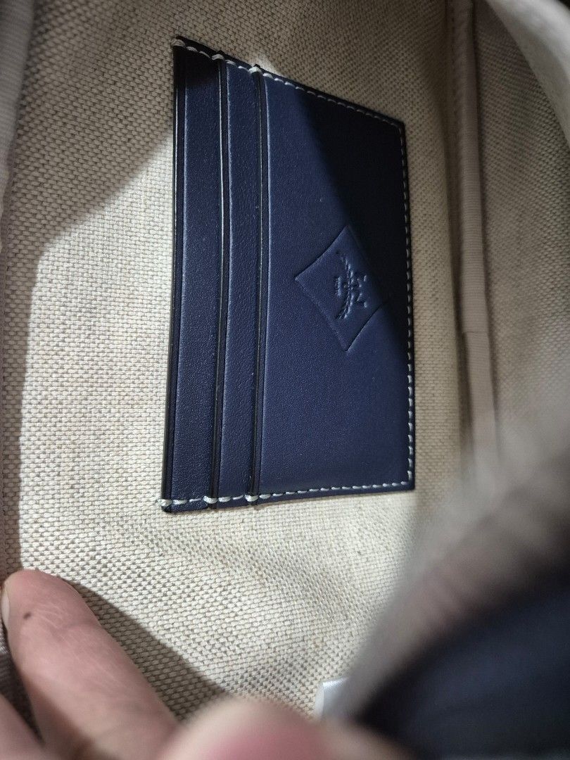 MCM Blue Crossbody Bag (Category: Luxury Bags & Wallets) located in Cabuyao City. Submitted by AR700 (Listing ID 1420472758, Image 3). Description: - Authentic MCM crossbody bag - Blue monogram pattern - Includes dust bag, authenticity card, and original packaging, paperbag - Interior with card slots and compartments - Adjustable shoulder strap - Secure zipper closure - Iconic MCM logo on the front Used a few times bought for 26k in SG sf c/o sel