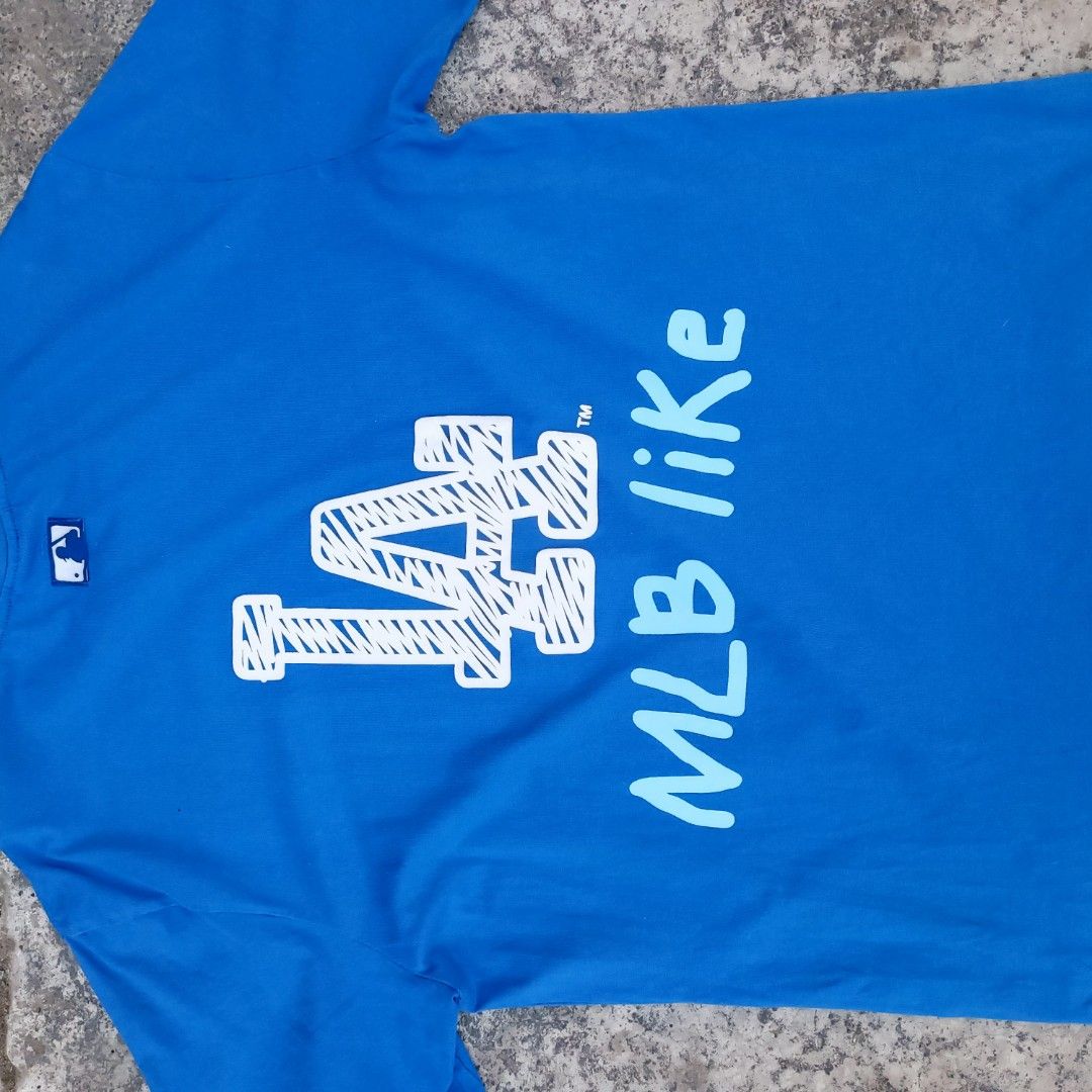 MLB Los Angeles Dodgers T-shirt (Category: Tshirts & Polo Shirts ) located in Manila. Submitted by notdian (Listing ID 1420458980, Image 3). Description: MLB L.A Dodgers Good Condition 9/10 Color Rate No Issues 20x29.