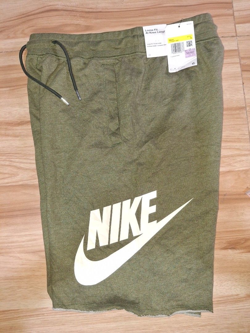 Nike Alumni Shorts - Olive Green (Category: Shorts) located in Bayambang. Submitted by ace_found_it_06 (Listing ID 1420360820, Image 1). Description: - Authentic Nike Sportswear Club Shorts - Olive green color - Size S - Features Nike logo - Drawstring waistband for adjustable fit - Made in Cambodia - New with tags - Perfect for casual wear and workouts - Measurements in images - Dimes : 28-33 x 21.