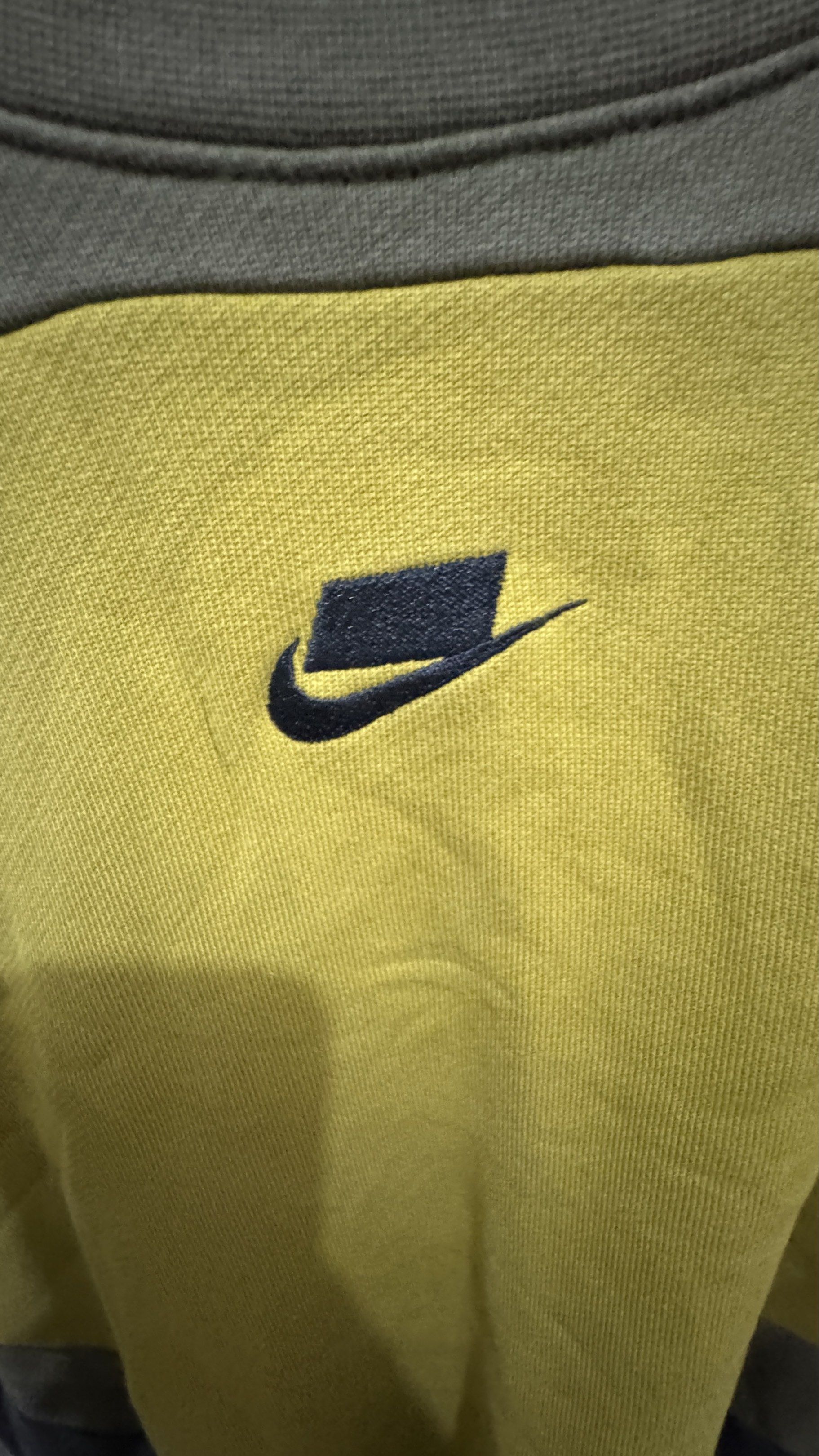Nike Colorblock Sweatshirt XL (Category: Coats, Jackets and Outerwear) located in Manila. Submitted by offthehype (Listing ID 1420440333, Image 3). Description: - Nike colorblock sweatshirt - Size: XL - Colors: Olive green, yellow, and gray - Design: Color-blocked panels - Features Nike logo on chest and back - Style: Crew neck, long sleeves - Made in China - Boxy cropped fit.