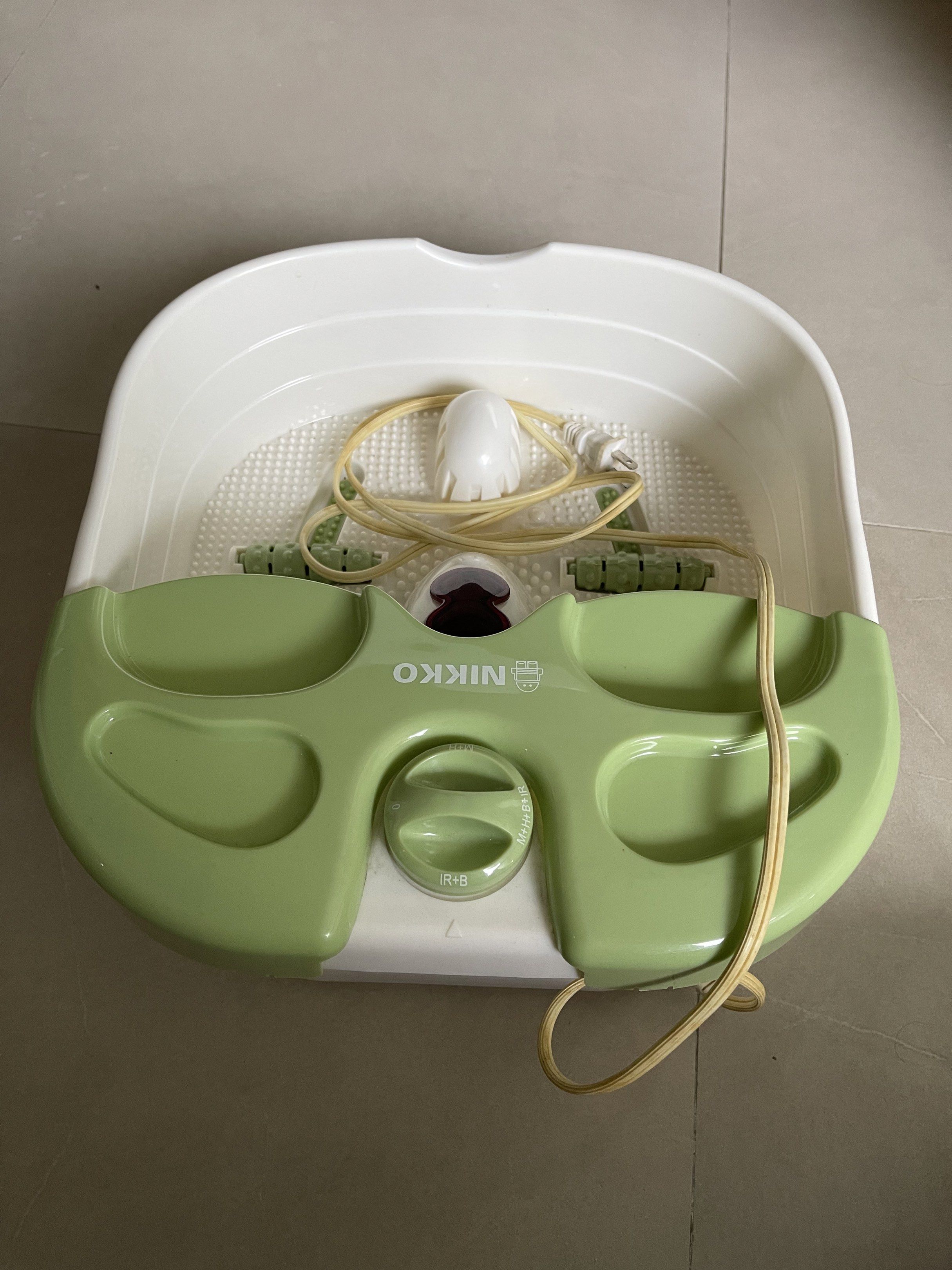 Nikko Foot Spa Massager (Category: Massage Devices) located in Manila. Submitted by jacob.so (Listing ID 1420362045, Image 1). Description: - Nikko foot spa massager - Green and white design - Adjustable settings dial - Includes power cord - Features massage roller - used 3x only.