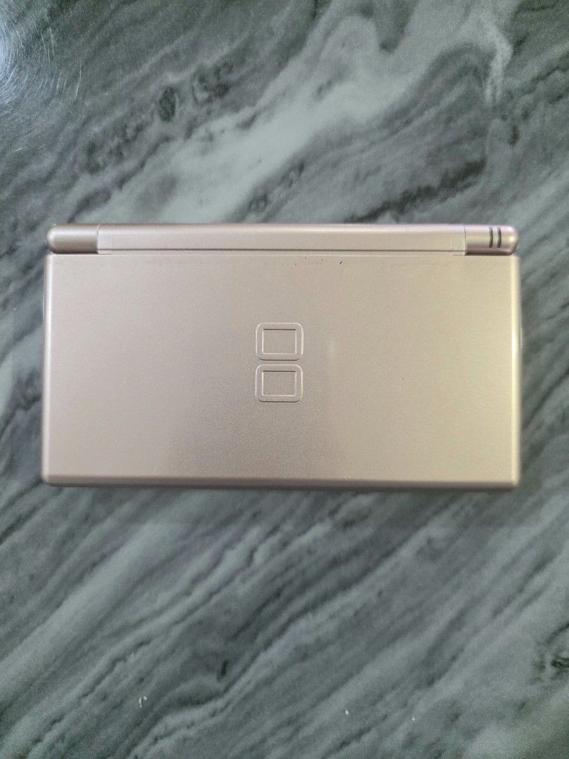 Nintendo DS Lite Metallic Rose Gold (Category: Nintendo) located in Mandaluyong City. Submitted by chan.ningtatum (Listing ID 1420472257, Image 1). Description: For Sale! Nintendo DS Lite Metallic Rose Includes: Unit, Stylus, gba cover & charger Good Working Condition. can play any region nintendo gameboy and ds game cartridge since unit is region free. Checkouts via Shope e and Laz ada Available Shipping: Lalamove, Grab Meet ups: Mandaluyong and