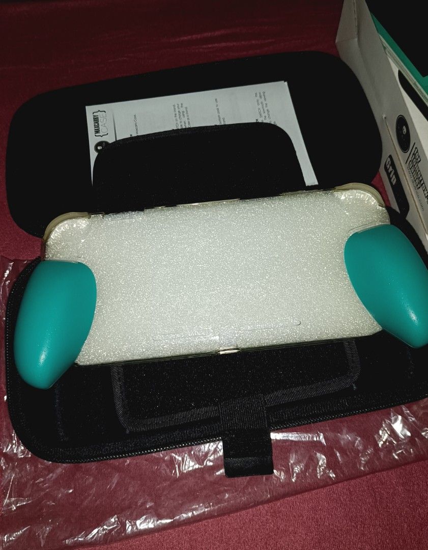 Nintendo Switch Lite Skull & Co Max Carry Grip Case Set Turquoise Used (Category: Cases & Covers) located in Pasay City. Submitted by gamelect_hub (Listing ID 1420491192, Image 2). Description: Sale Skull & Co Max Carry Case Set Used No Issue Color: ( Turquoise ) WYSIWYG For Switch Lite Only Price: 600php fix Actual Photo Posted Location: Pasay Meetups, baclaran, sm sucat, taft edsa, MOA or via Book like lalamove grab toktok etc standard shipping