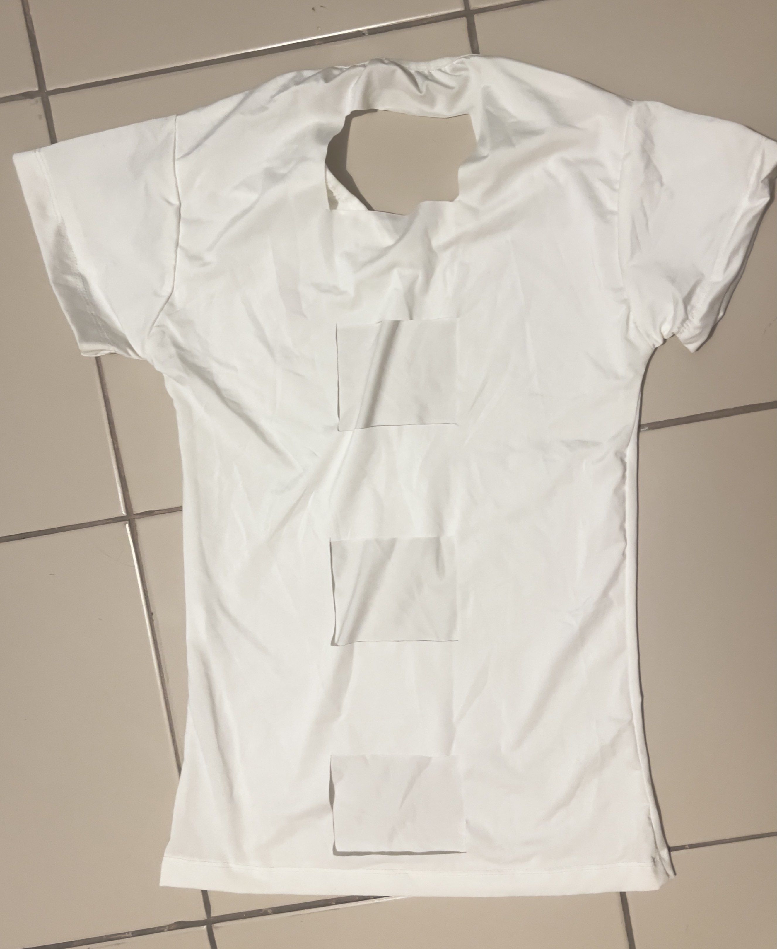Nurse Costume White Top (Category: Others Tops) located in Cainta. Submitted by barbie714 (Listing ID 1420519129, Image 2). Description: - White nurse costume top - Features a red cross emblem - V-neck and short sleeves - Unique back cut-out design - Made of lightweight material - Ideal for costume parties and themed events.