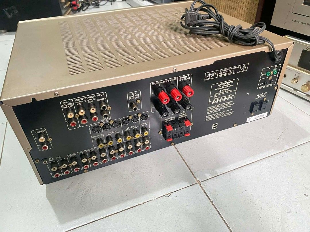 Onkyo A-SV640 AV Surround Integrated Amplifier (Category: Soundbars, Speakers & Amplifiers) located in Caloocan City. Submitted by noeld316982578 (Listing ID 1420475425, Image 3). Description: Onkyo A-SV640 AV surround integrated amplifier. Features multiple input and output ports for various audio and video devices. Includes speaker terminals and remote control inputs. The back panel indicates a power output of 200W. Manufactured by Onkyo Corpor