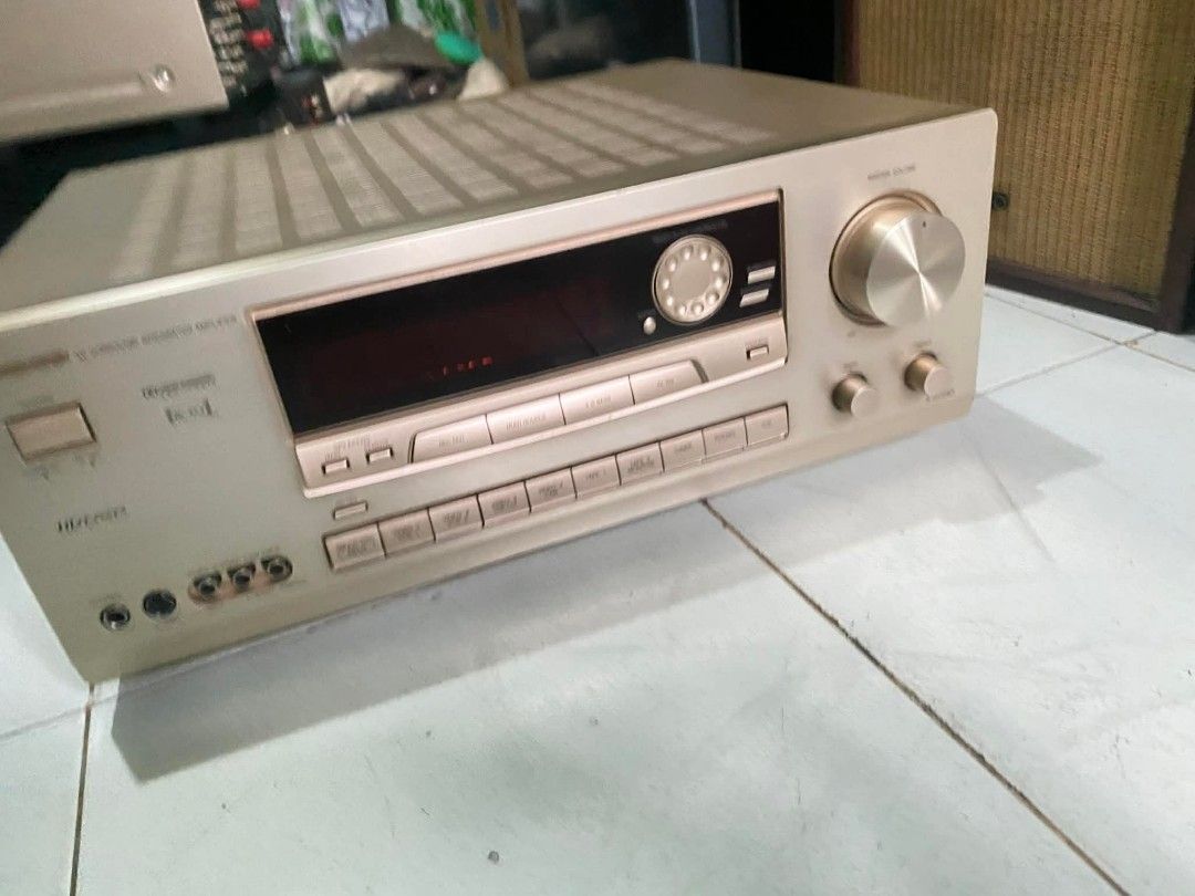 Onkyo A-SV640 AV Surround Integrated Amplifier (Category: Soundbars, Speakers & Amplifiers) located in Caloocan City. Submitted by noeld316982578 (Listing ID 1420475425, Image 1). Description: Onkyo A-SV640 AV surround integrated amplifier. Features multiple input and output ports for various audio and video devices. Includes speaker terminals and remote control inputs. The back panel indicates a power output of 200W. Manufactured by Onkyo Corpor