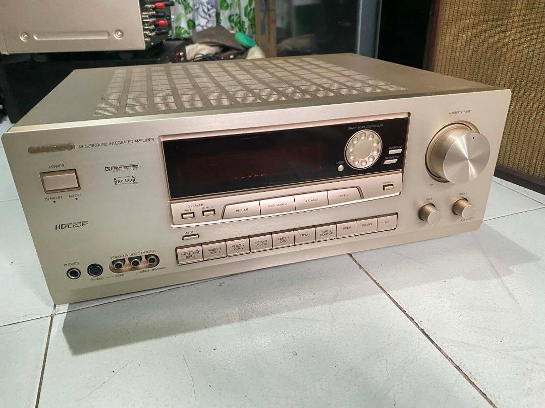 Onkyo A-SV640 AV Surround Integrated Amplifier (Category: Soundbars, Speakers & Amplifiers) located in Caloocan City. Submitted by noeld316982578 (Listing ID 1420475425, Image 2). Description: Onkyo A-SV640 AV surround integrated amplifier. Features multiple input and output ports for various audio and video devices. Includes speaker terminals and remote control inputs. The back panel indicates a power output of 200W. Manufactured by Onkyo Corpor