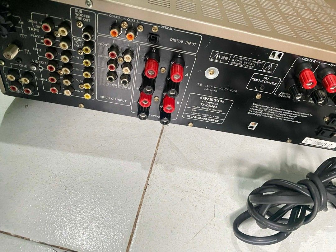 Onkyo TX-DS484 AV Receiver (Category: Soundbars, Speakers & Amplifiers) located in Caloocan City. Submitted by noeld316982578 (Listing ID 1420475568, Image 3). Description: - Onkyo TX-DS484 AV receiver - Gold color - Includes power cable - Features digital input - Multiple input/output ports - Front panel controls and volume knob.