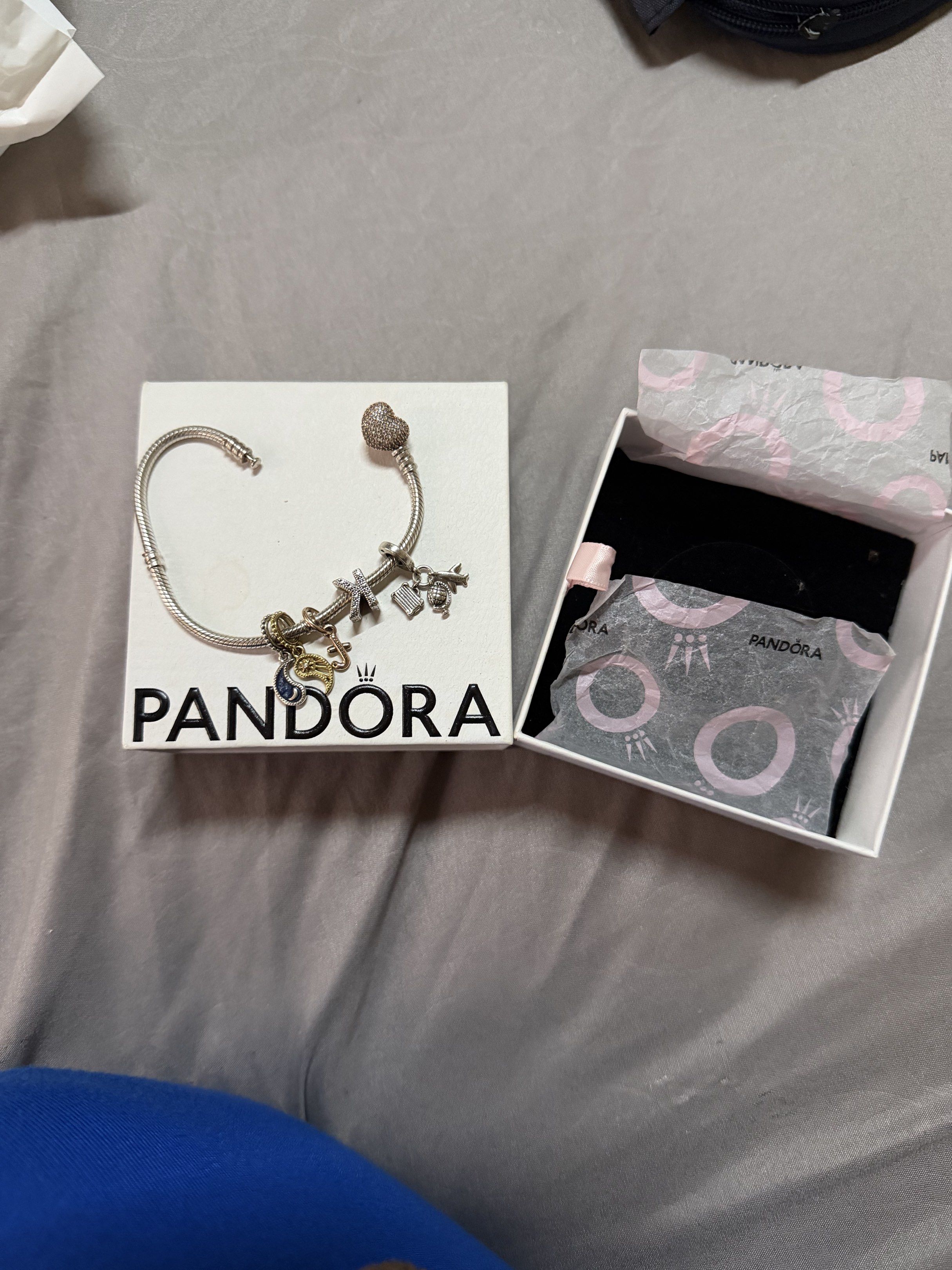 Pandora Bracelet with Charms (Category: Bracelets) located in Caloocan City. Submitted by bbkk08 (Listing ID 1420407961, Image 3). Description: FOR SALE: Authentic PANDORA Bracelet with 4 Charms • ✅ 100% AUTHENTIC PANDORA – Not fake You may have it checked at any PANDORA store for cleaning or authentication. • 💎 Brand: PANDORA • 🎀 Inclusions: Bracelet + 4 charms • 💰 Original total value: ₱31,000 • 🔥 Selling price: ₱15,000 only ✨ Well-kept and