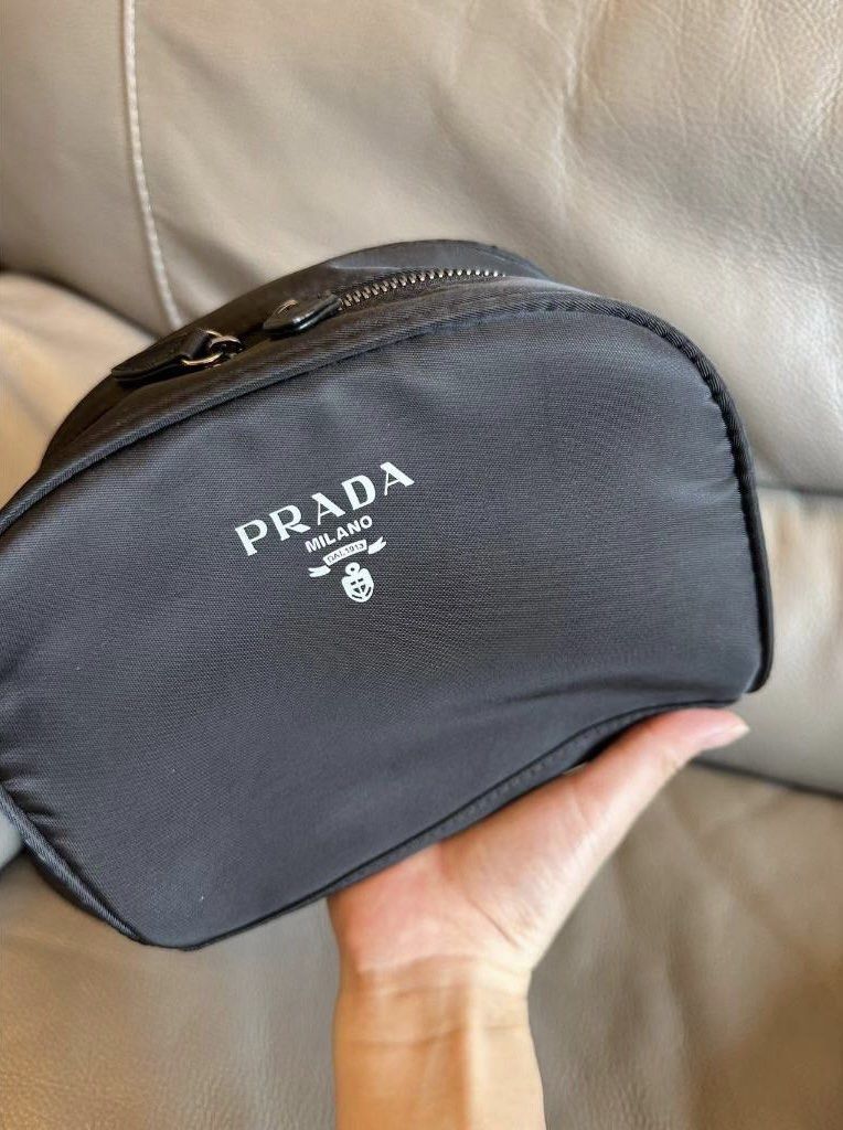 Prada Pouch GWP (Category: Luxury Bags & Wallets) located in Paranaque City. Submitted by jujudeclutterss (Listing ID 1420502084, Image 2). Description: Prada Pouch GWP BRAND NEW.