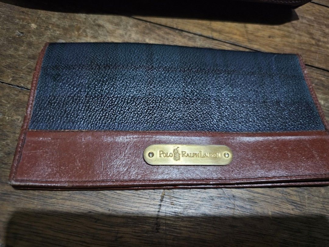 Ralph Lauren Plaid Bags (Category: Luxury Bags & Wallets) located in Manila. Submitted by onlinesmartshopping12 (Listing ID 1420457769, Image 3). Description: - Polo Ralph Lauren bag set - Features a classic plaid pattern - Accented with brown leather - Includes: - Small wallet - Rectangular bag - Two additional bags - All bags feature a gold-colored Polo Ralph Lauren logo - Made from a durable material.