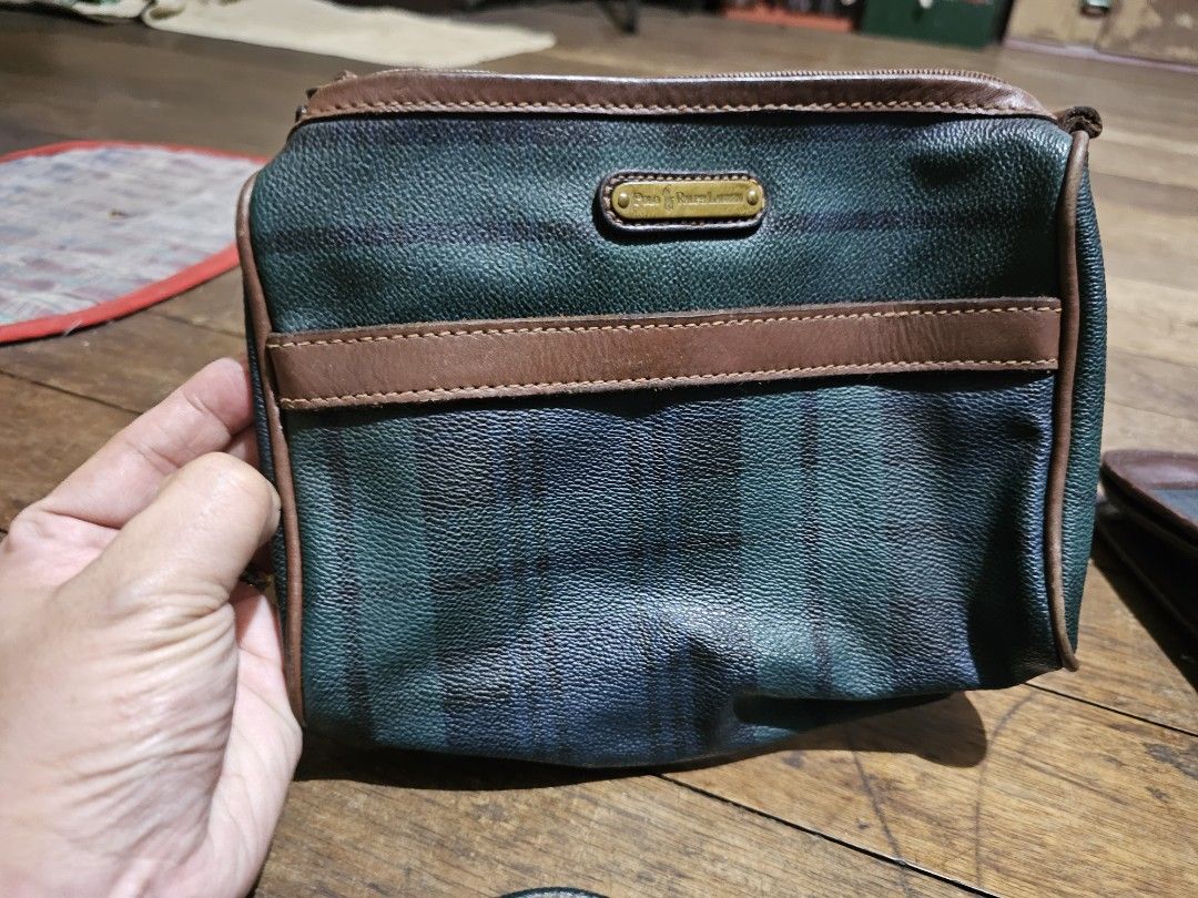 Ralph Lauren Plaid Bags (Category: Luxury Bags & Wallets) located in Manila. Submitted by onlinesmartshopping12 (Listing ID 1420457769, Image 2). Description: - Polo Ralph Lauren bag set - Features a classic plaid pattern - Accented with brown leather - Includes: - Small wallet - Rectangular bag - Two additional bags - All bags feature a gold-colored Polo Ralph Lauren logo - Made from a durable material.