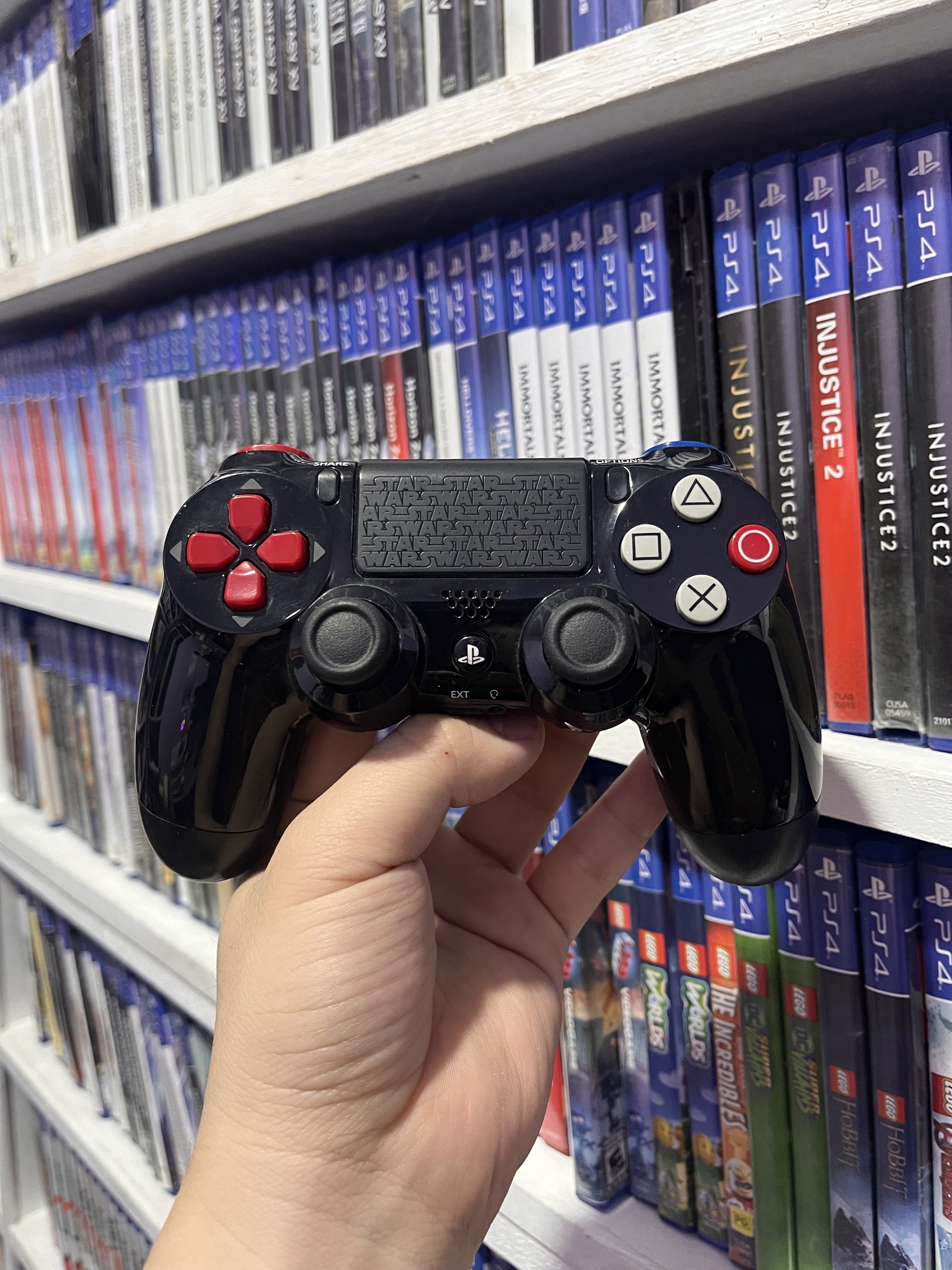 (RARE) Authentic Dualshock 4 Darth Vader (Category: Controllers) located in Manila. Submitted by 828gamingphmnl (Listing ID 1420425633, Image 2). Description: For sale only Dualshock 4 Darth Vader Edition Complete with box Very rare Used, no issues. P2,999 fixed.