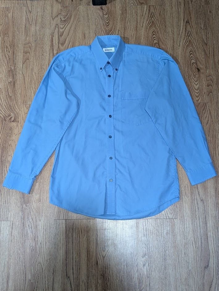 Sahara Blue Button-down Polo (Category: Formal Shirts) located in Manila. Submitted by fromsiah (Listing ID 1420523119, Image 2). Description: Pre-owned Sahara Blue Button-down Polo SIZE: Small DIMENSIONS: Width - 20in Length - 27.5in CONDITION: 9/10 ISSUE: Very small stain in right shoulder area Color may vary due to lighting.