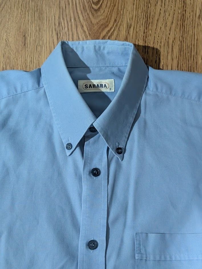 Sahara Blue Button-down Polo (Category: Formal Shirts) located in Manila. Submitted by fromsiah (Listing ID 1420523119, Image 3). Description: Pre-owned Sahara Blue Button-down Polo SIZE: Small DIMENSIONS: Width - 20in Length - 27.5in CONDITION: 9/10 ISSUE: Very small stain in right shoulder area Color may vary due to lighting.