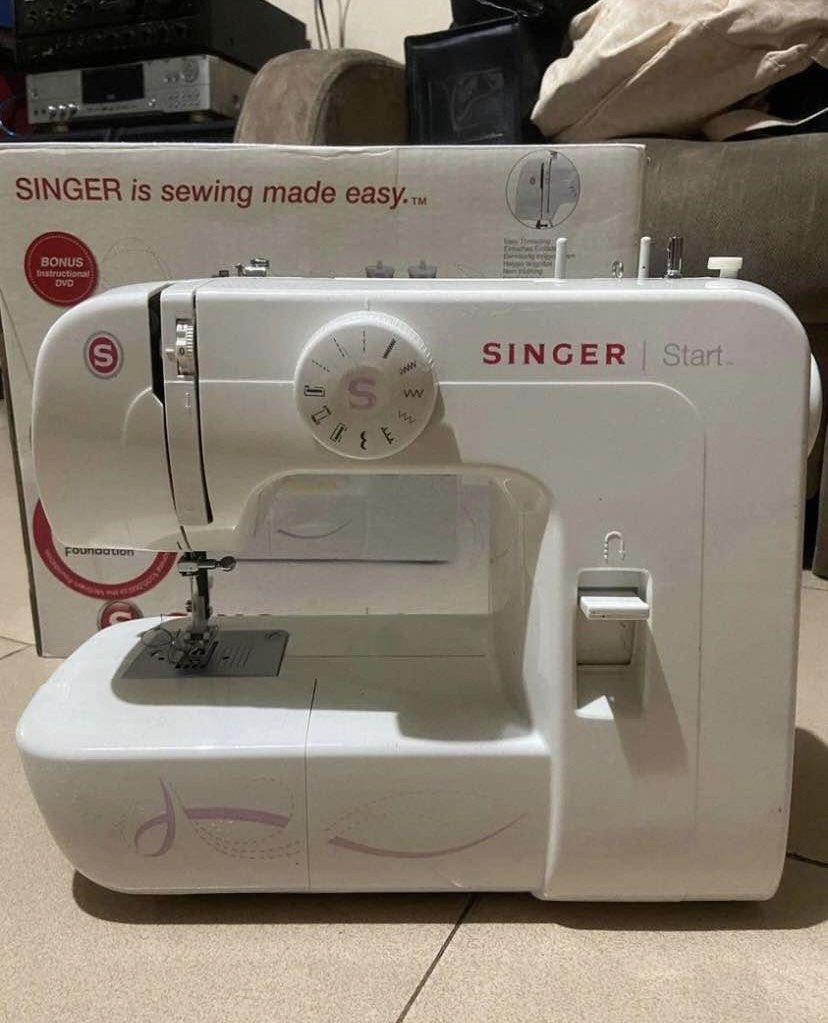 Singer Start 1306 Sewing Machine (Category: Craft Supplies & Tools) located in Manila. Submitted by khaleesi_bkk2 (Listing ID 1420533861, Image 1). Description: - bought in Australia -Singer Start 1306 sewing machine - Includes original box - Bonus instructional DVD included - Comes with a foot pedal - Features a white body with circular stitch selector - Designed for easy sewing.
