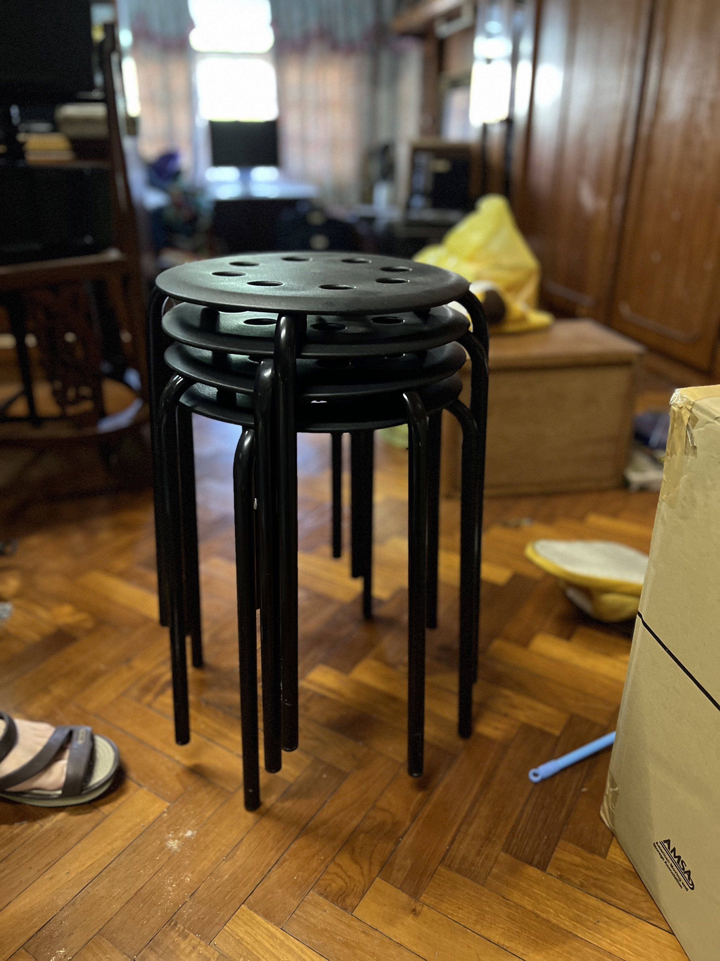 Stackable Black Stools (Category: Chairs) located in Kuala Lumpur. Submitted by jericang (Listing ID 1420460089, Image 1). Description: - Stackable black stools - Round seat with holes - Sturdy black metal legs - Suitable for various uses - Easy to store (stackable) - Ready for immediate use.