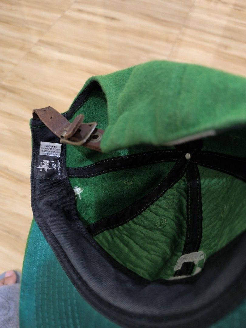 Stussy x Ebbets Field Vintage Cap (Category: Caps & Hats) located in Manila. Submitted by yanggoonz (Listing ID 1420525468, Image 3). Description: - Green cap with white "S" logo - Features Stussy logo on the side - Includes Ebbets Field Vintage Flanels tag - Adjustable leather strap.