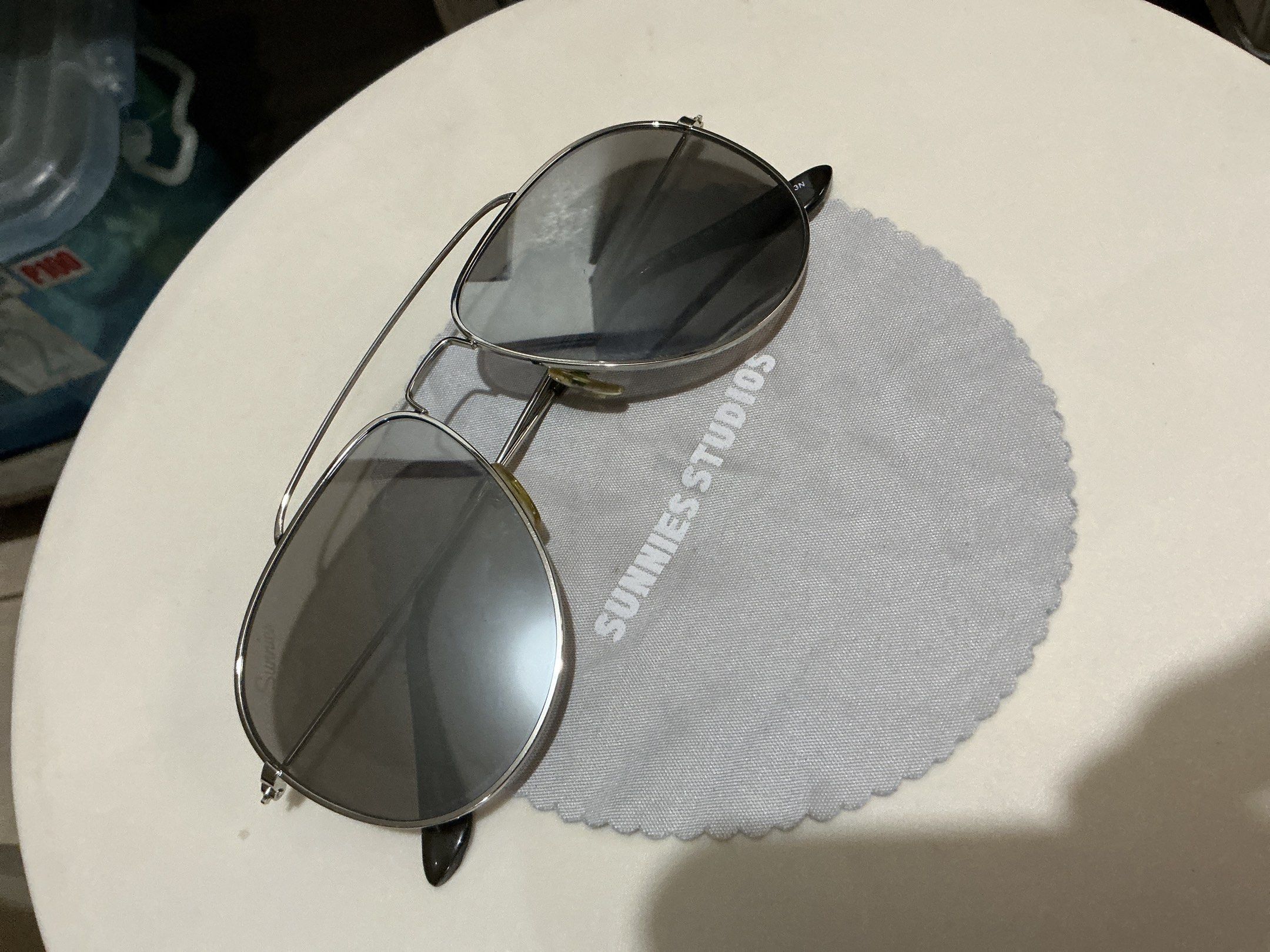 Sunnies Studios Sloan Sunglasses in Silver (Category: Sunglasses & Eyewear) located in Manila. Submitted by harbs05 (Listing ID 1420389894, Image 1). Description: - Sunnies Studios sunglasses - Silver frame - Dark lenses - Includes Sunnies Studios cleaning cloth - Classic aviator design - Perfect for everyday wear - Provides sun protection.