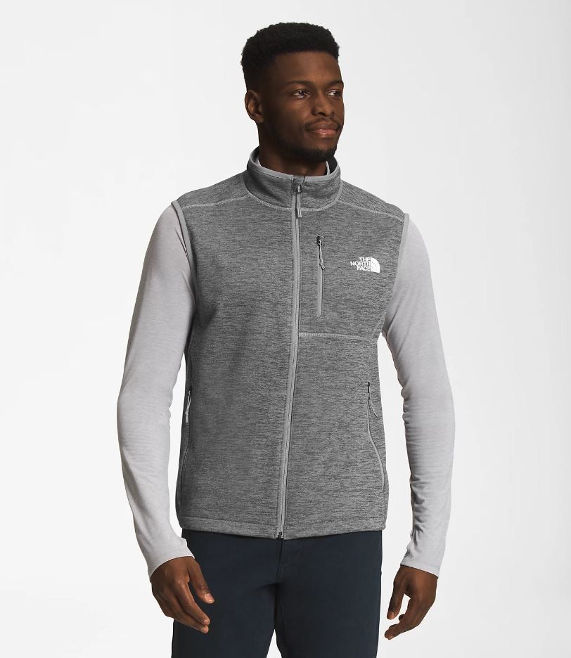 The North Face Vest (Category: Vests) located in Manila. Submitted by brugodoy (Listing ID 1420514773, Image 1). Description: - The North Face vest in gray - Features: - Full zip closure - Stand-up collar - Small chest pocket - The North Face logo on chest and back - Perfect for layering.