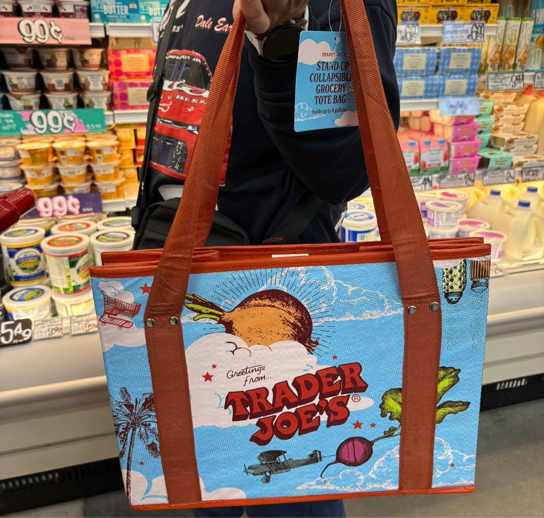 Trader Joe's Tote Bags (Category: Tote Bags) located in Bacolod City. Submitted by girlydecluttering (Listing ID 1420368420, Image 3). Description: - Includes: - Classic white and navy Trader Joe's logo bag. - Red cheese-themed bag. - Blue collapsible bag. - Sturdy handles. - Ideal for groceries and everyday use..