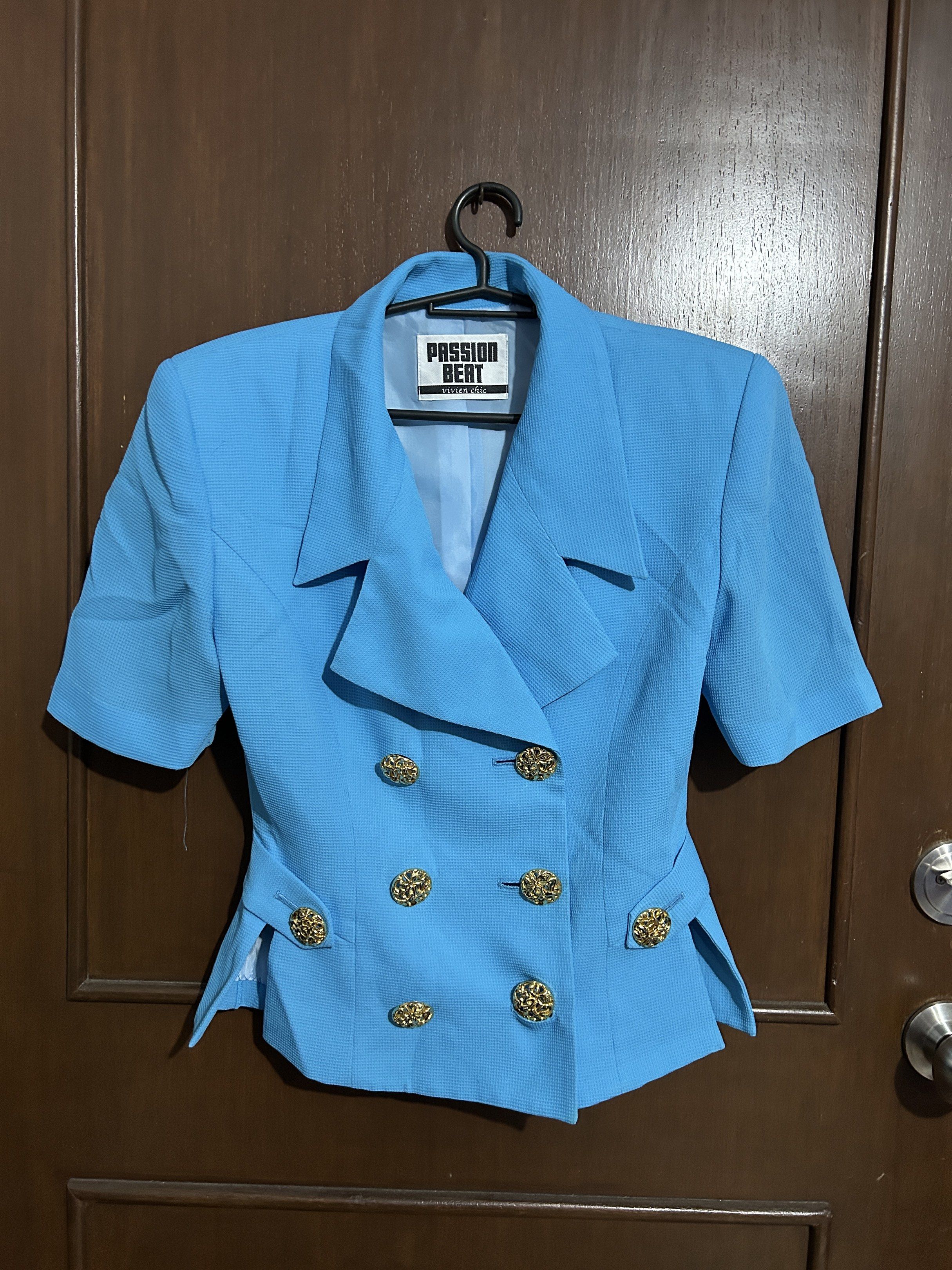 Vintage Blue Blazer with Gold Buttons (Category: Coats, Jackets and Outerwear) located in Manila. Submitted by yuShin09 (Listing ID 1420524185, Image 1). Description: - Passion Beat blue blazer (Vintage) - Looks good when worn - Double-breasted design - Decorative gold buttons - Tailored fit - Classic collar - Chic and stylish.