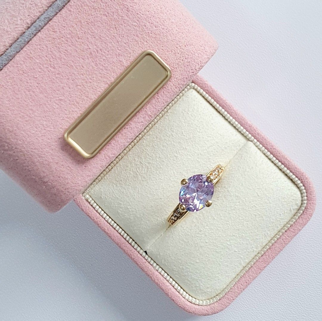 Vintage Unsigned Gold Tone Ring (Category: Rings) located in Cagayan de Oro. Submitted by vintagejewelriestreasuresph (Listing ID 1420489341, Image 1). Description: AVAILABLE ITEM: Unsigned Gold Tone Vintage Birthstone Ring With Clear And Oval Cut Smoky Amethyst Stone Details. Size 7; Fixed Band. •PRICE: PHP1,250 •CONDITION: EXCELLENT VINTAGE CONDITION ( Aged Items With Very Minimal And Light Signs Of Wear If Any At All, Very Light Natural Patina