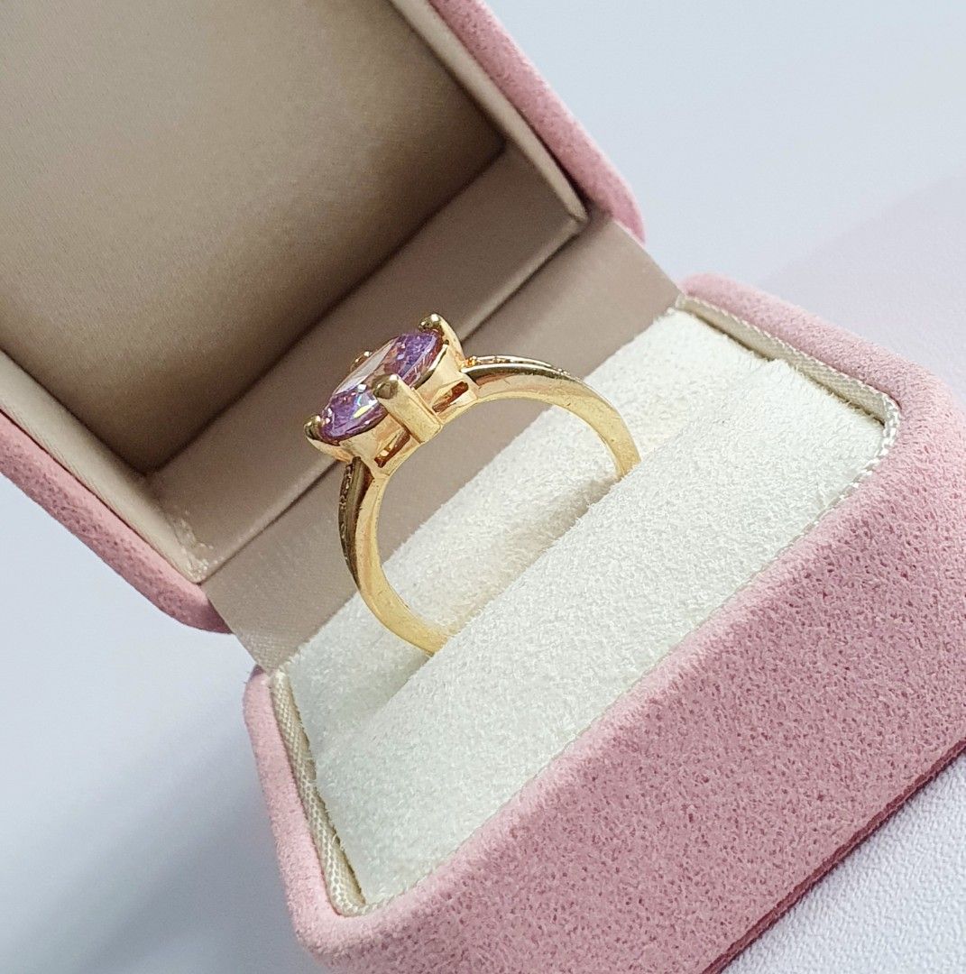 Vintage Unsigned Gold Tone Ring (Category: Rings) located in Cagayan de Oro. Submitted by vintagejewelriestreasuresph (Listing ID 1420489341, Image 2). Description: AVAILABLE ITEM: Unsigned Gold Tone Vintage Birthstone Ring With Clear And Oval Cut Smoky Amethyst Stone Details. Size 7; Fixed Band. •PRICE: PHP1,250 •CONDITION: EXCELLENT VINTAGE CONDITION ( Aged Items With Very Minimal And Light Signs Of Wear If Any At All, Very Light Natural Patina