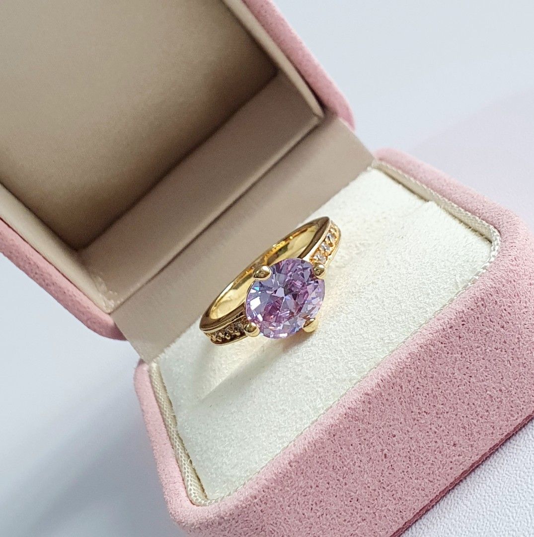 Vintage Unsigned Gold Tone Ring (Category: Rings) located in Cagayan de Oro. Submitted by vintagejewelriestreasuresph (Listing ID 1420489341, Image 3). Description: AVAILABLE ITEM: Unsigned Gold Tone Vintage Birthstone Ring With Clear And Oval Cut Smoky Amethyst Stone Details. Size 7; Fixed Band. •PRICE: PHP1,250 •CONDITION: EXCELLENT VINTAGE CONDITION ( Aged Items With Very Minimal And Light Signs Of Wear If Any At All, Very Light Natural Patina