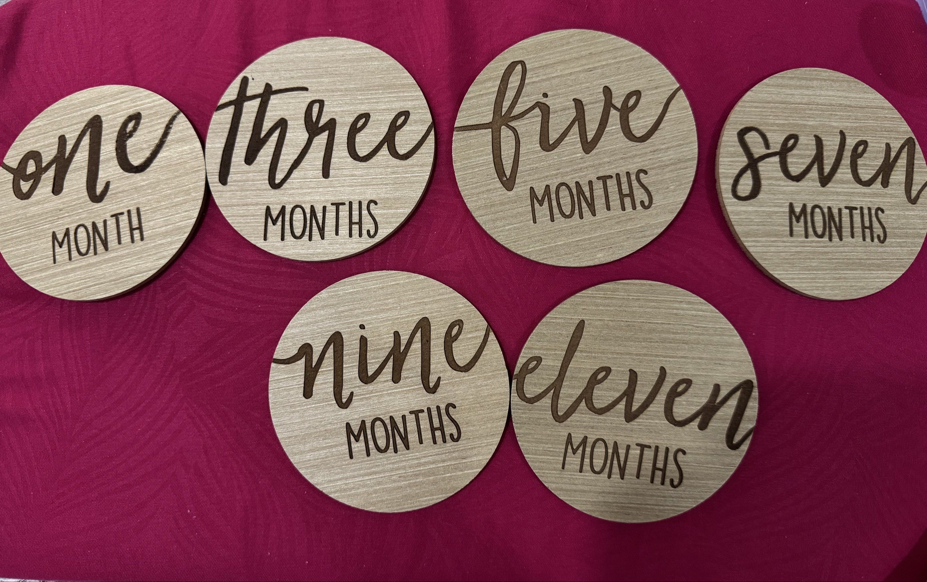 Wooden Baby Milestone Discs (Category: Other Kids Furniture) located in Cainta. Submitted by fifffiiii (Listing ID 1420368036, Image 1). Description: - Set of wooden milestone discs for baby photos. - Includes discs for: 1 to 12 months. - Each disc is round with engraved text. - Great for capturing baby's monthly milestones. - Perfect for photos!.