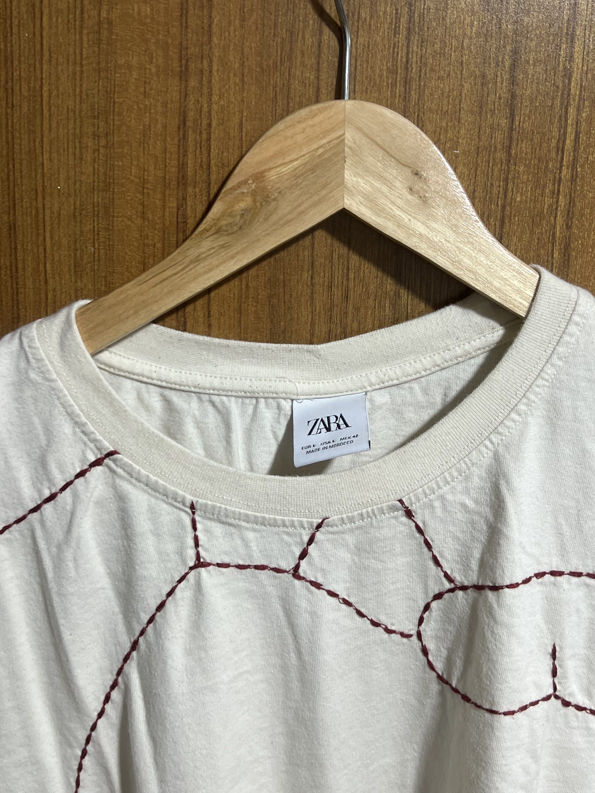 Zara Embroidered T-shirt (Category: Tshirts & Polo Shirts ) located in Manila. Submitted by drreeves (Listing ID 1420554389, Image 3). Description: - Zara cream-colored t-shirt - Size: L but fits M-L.