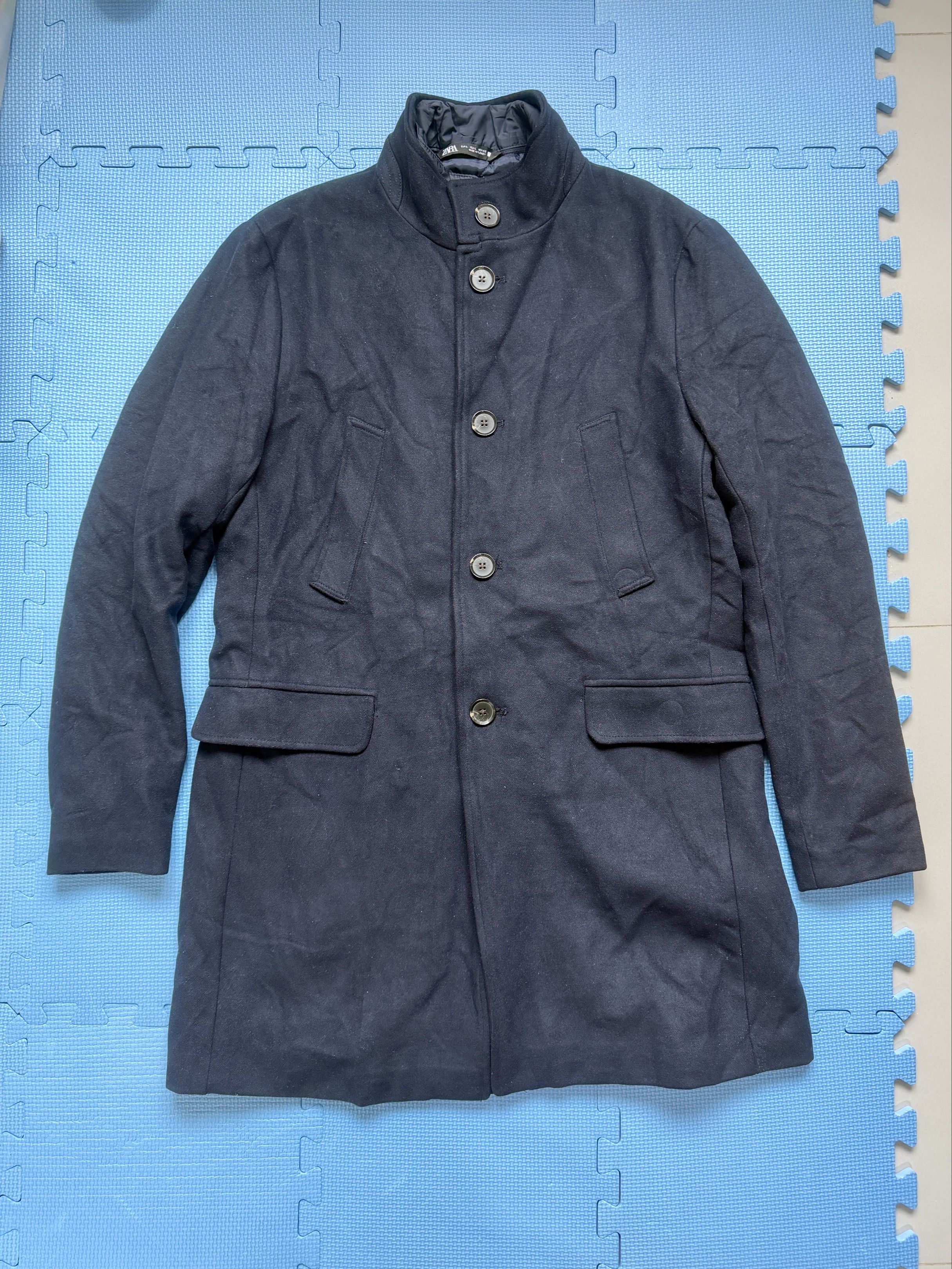 Zara Navy Blue Coat - Size L (Category: Coats, Jackets and Outerwear) located in Pasay City. Submitted by bbdavid (Listing ID 1414115765, Image 1). Description: - Zara navy blue coat - Size: L - Color: Navy blue - Button closure - Optional inner zipper closure - Two front pockets - Quilted lining - Made in Turkey - Material: 100% polyester When laid flat: - Length 35.5in - Shoulder width 18in.