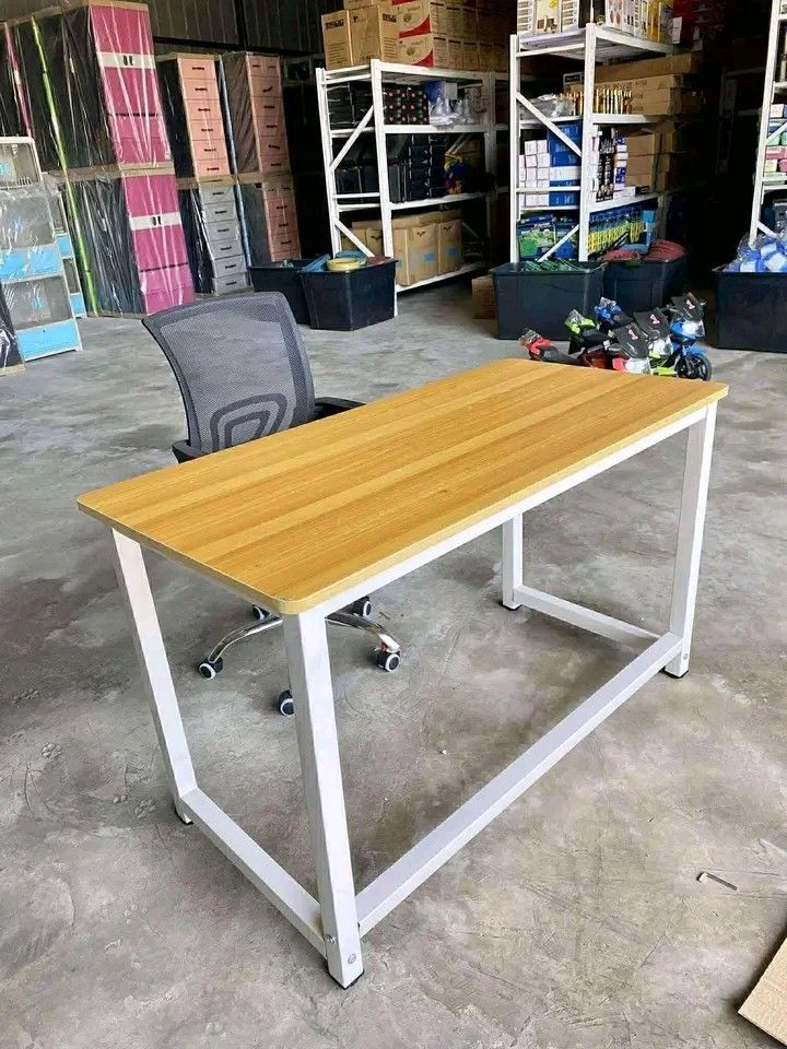 120cm Computer Desk/Table (Category: Tables & Sets) located in Makati City. Submitted by oideme (Listing ID 1420666916, Image 2). Description: - Wood grain surface - Sturdy white legs - Simple and functional design - Size: 120x60cm - Ready for immediate use - Perfect for home or office.