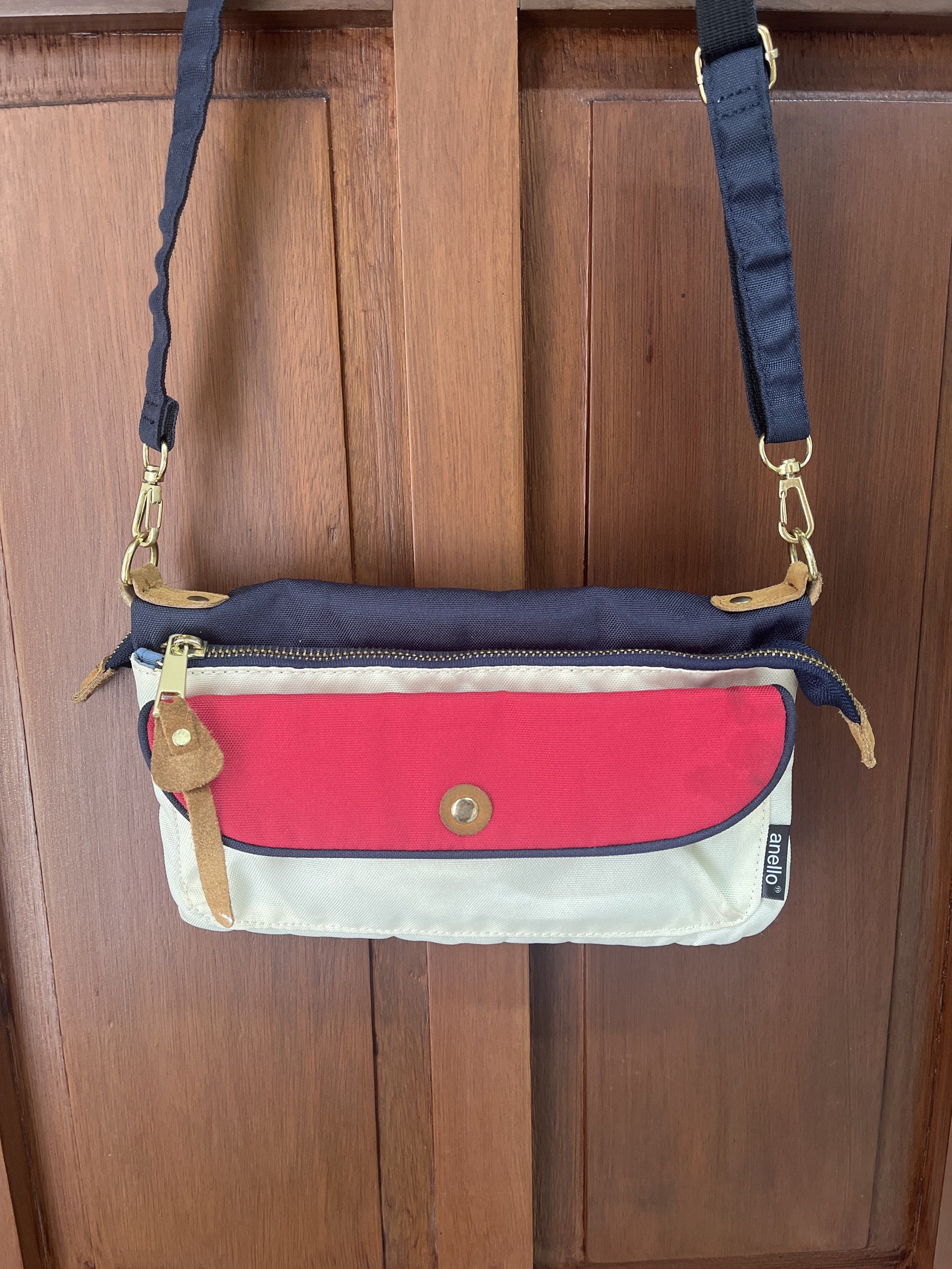 Anello Crossbody Bag (Category: Cross-body Bags) located in Muntinlupa City. Submitted by timttam (Listing ID 1420603556, Image 2). Description: - blue red cream cross body bag - has multiple compartments - anello brand .