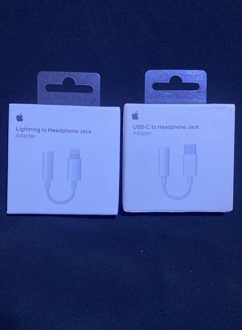 Apple Lightning to Headphone Jack Adapter & USB-C Adapter (Category: Chargers & Cables) located in Manila. Submitted by milasgadgetph (Listing ID 1420567692, Image 1). Description: Genuine Apple adapters for connecting headphones. Includes both Lightning to Headphone Jack Adapter and USB-C to Headphone Jack Adapter. Both are in their original packaging. Perfect for those who need to use their headphones with different Apple devices. Get yours now
