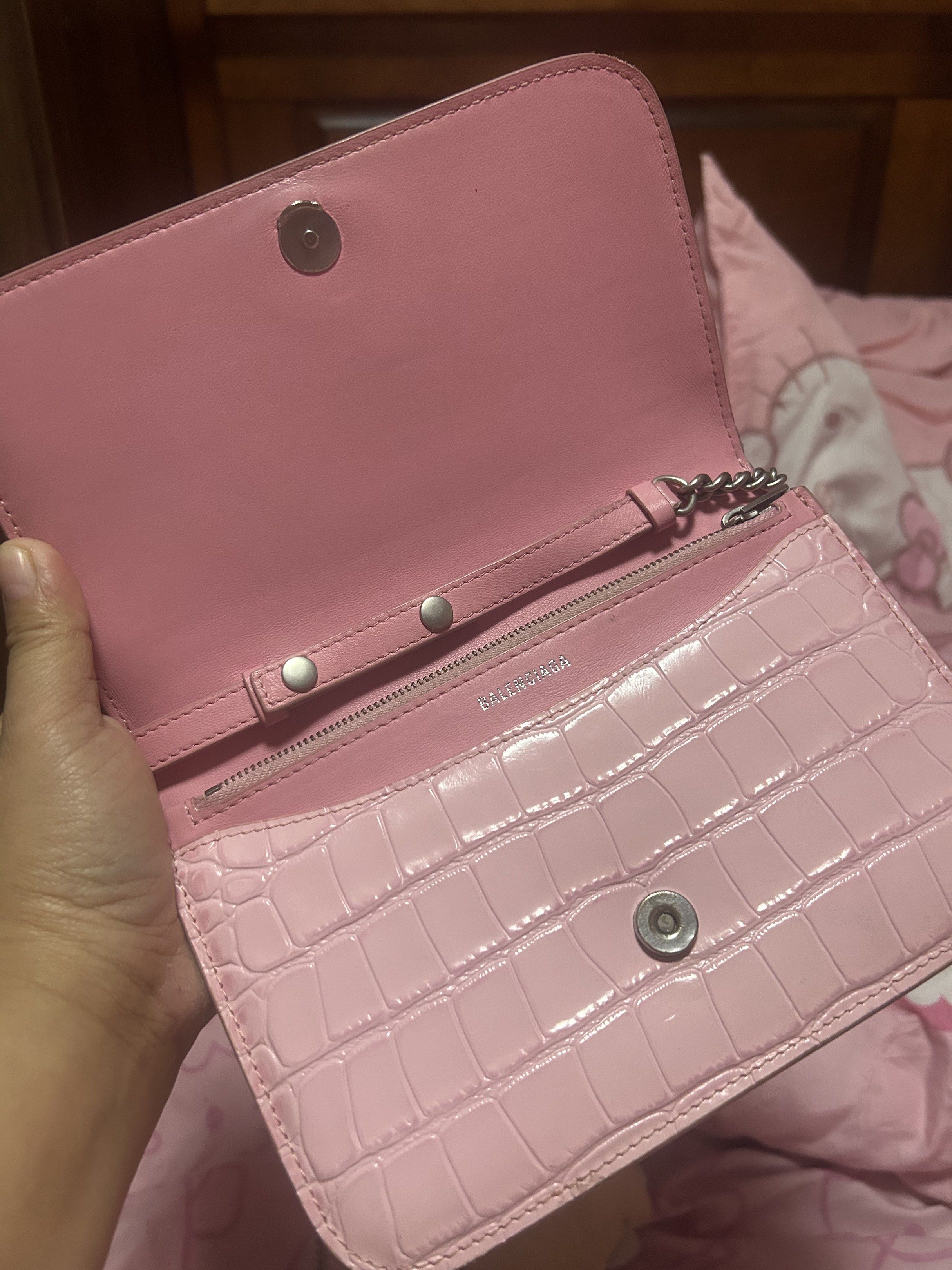 Balenciaga Pink Croc-Embossed Shoulder Bag (Category: Luxury Bags & Wallets) located in Rizal. Submitted by nnejzediugi (Listing ID 1420603565, Image 2). Description: - Pink shoulder bag - Croc-embossed finish - Silver chain strap - 'B' logo on front - Pink interior - Zipper pocket - Magnetic closure - Brand visible inside.