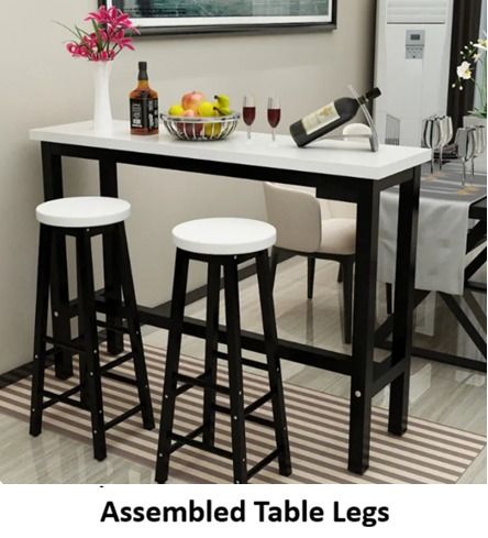 Bar Table with Stools (Category: Tables & Sets) located in Caloocan City. Submitted by alverstone.vault-66026 (Listing ID 1420581440, Image 1). Description: Stylish bar table set perfect for small spaces. Features a white tabletop with black metal legs. Includes two stools with white seats and black legs. Table legs are assembled. Ideal for a kitchen or dining area. Great for entertaining or casual dining. One table and two chairs: Table: 120cm (
