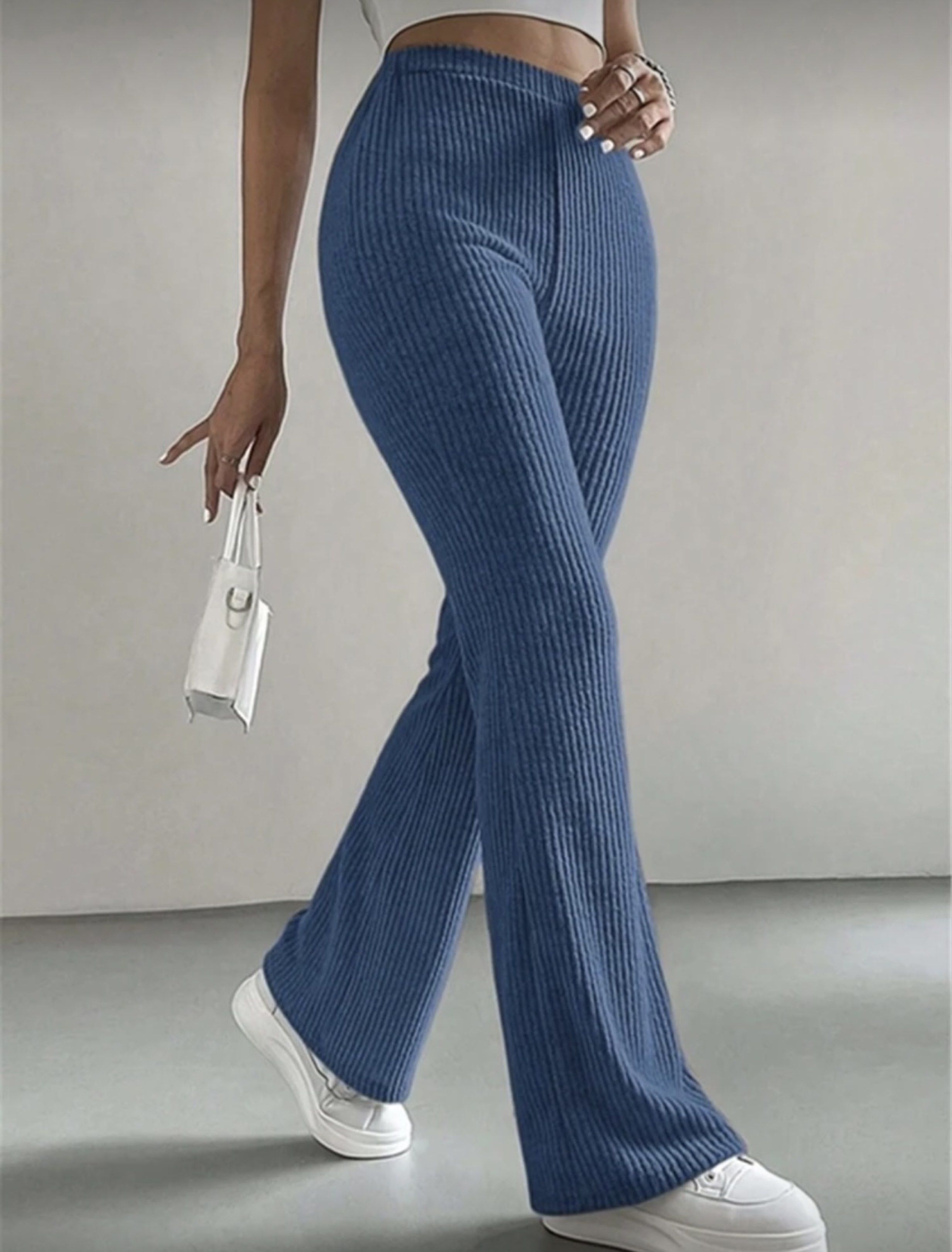 Blue Ribbed Flare Pants (Category: Other Bottoms) located in Silang. Submitted by declutter_cat (Listing ID 1420638261, Image 2). Description: Shein Flare Pants L on tag, fits M-L Worn once, good as new. RSF: decluttering Meet up: Around Dasma, Tagaytay, Silang MOP: Gcash & Bank .
