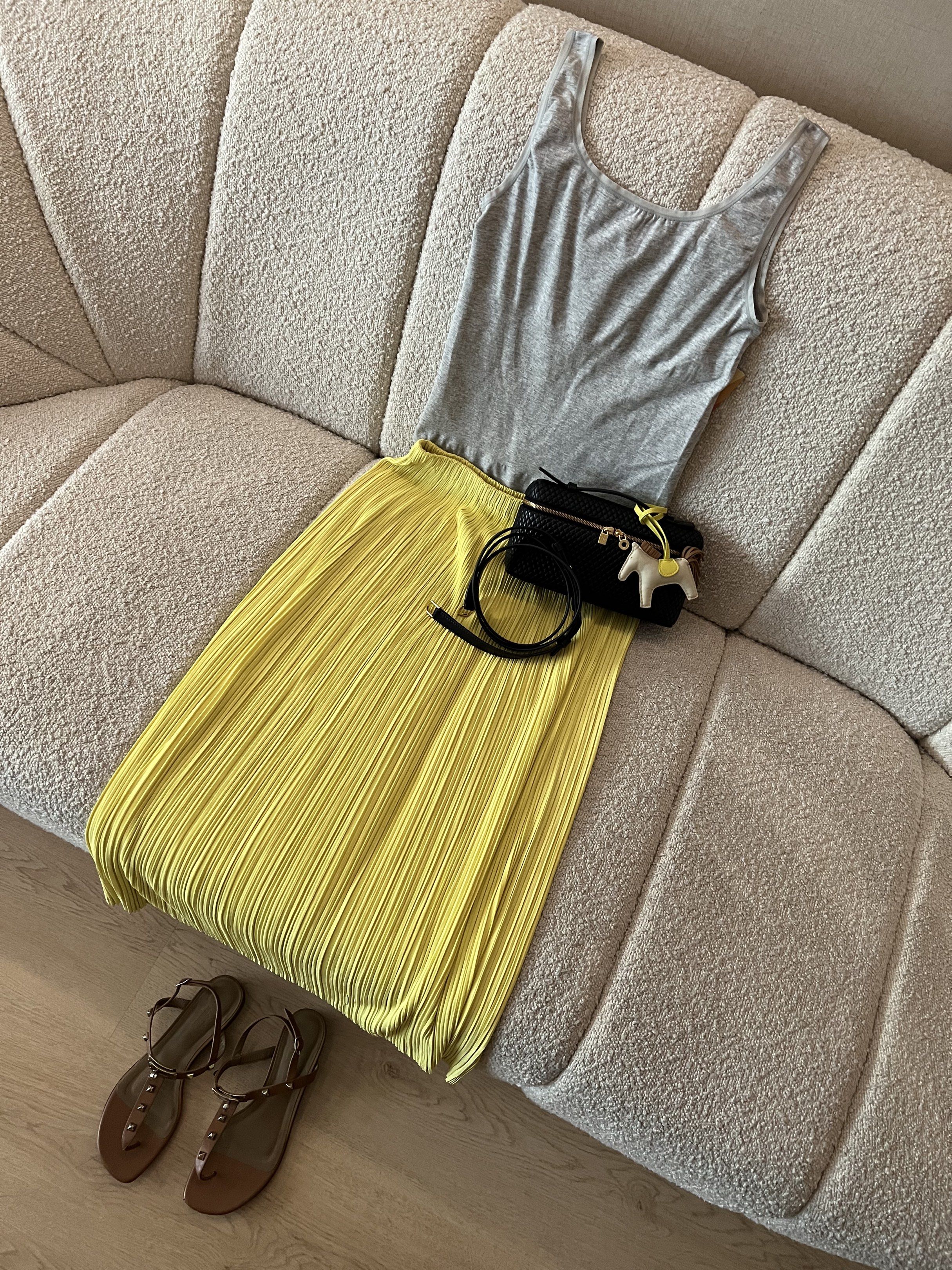 BNWT Issey Miyake Pleats Please Maxi Skirt Authentic (Category: Luxury Apparel) located in Quezon City. Submitted by kayes_closet (Listing ID 1420671217, Image 1). Description: Pleated Skirt from Issey Miyake - brand is renowned for its unique garment pleating technique. Comfy and wrinkle-resistant in lime yellow ( between green and yellow ) . Makes for the perfect travel companion as this skirt takes up little space when packed and is washable. 