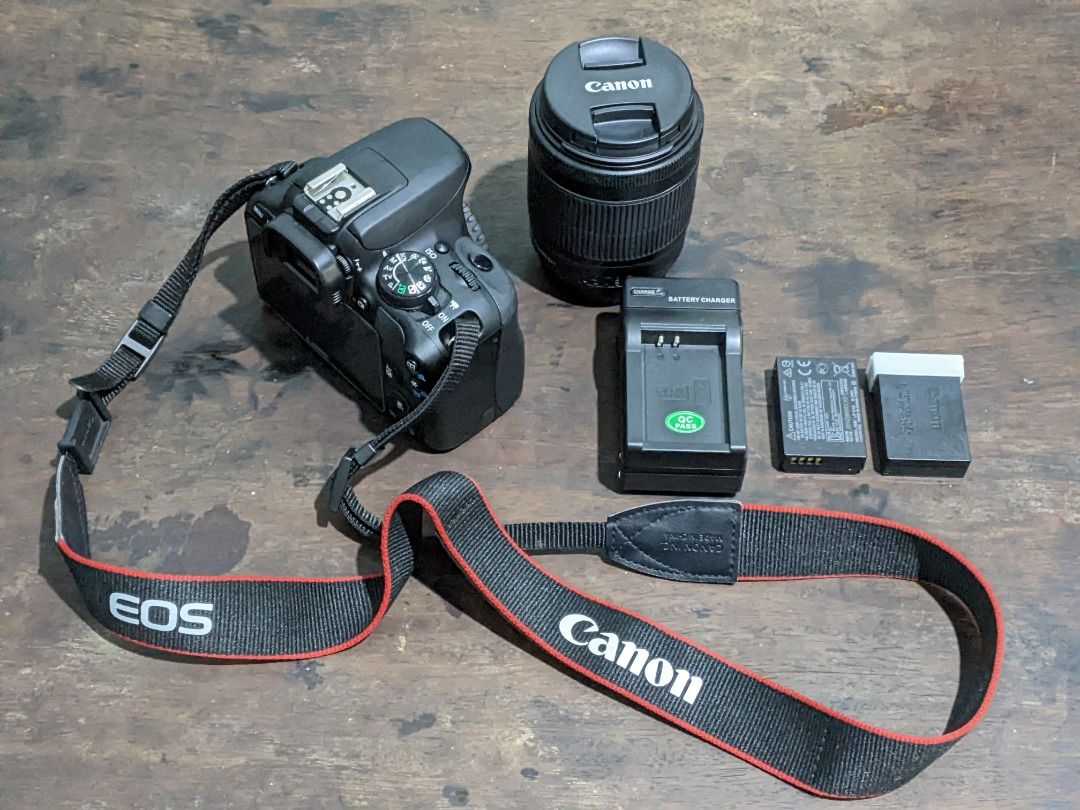 Canon EOS SL1 / 100D (Category: Cameras) located in Quezon City. Submitted by glitzytech (Listing ID 1420664821, Image 2). Description: For Sale Only: Canon EOS SL1 / 100D - Includes kit lens 18-55mm, charger, and two batteries (one battery drains fast) - Comes with Canon camera strap and lens cap - Display screen with protective glass - In good working condition. All function working. Meet up: Araneta, Cubao God bless us all!.