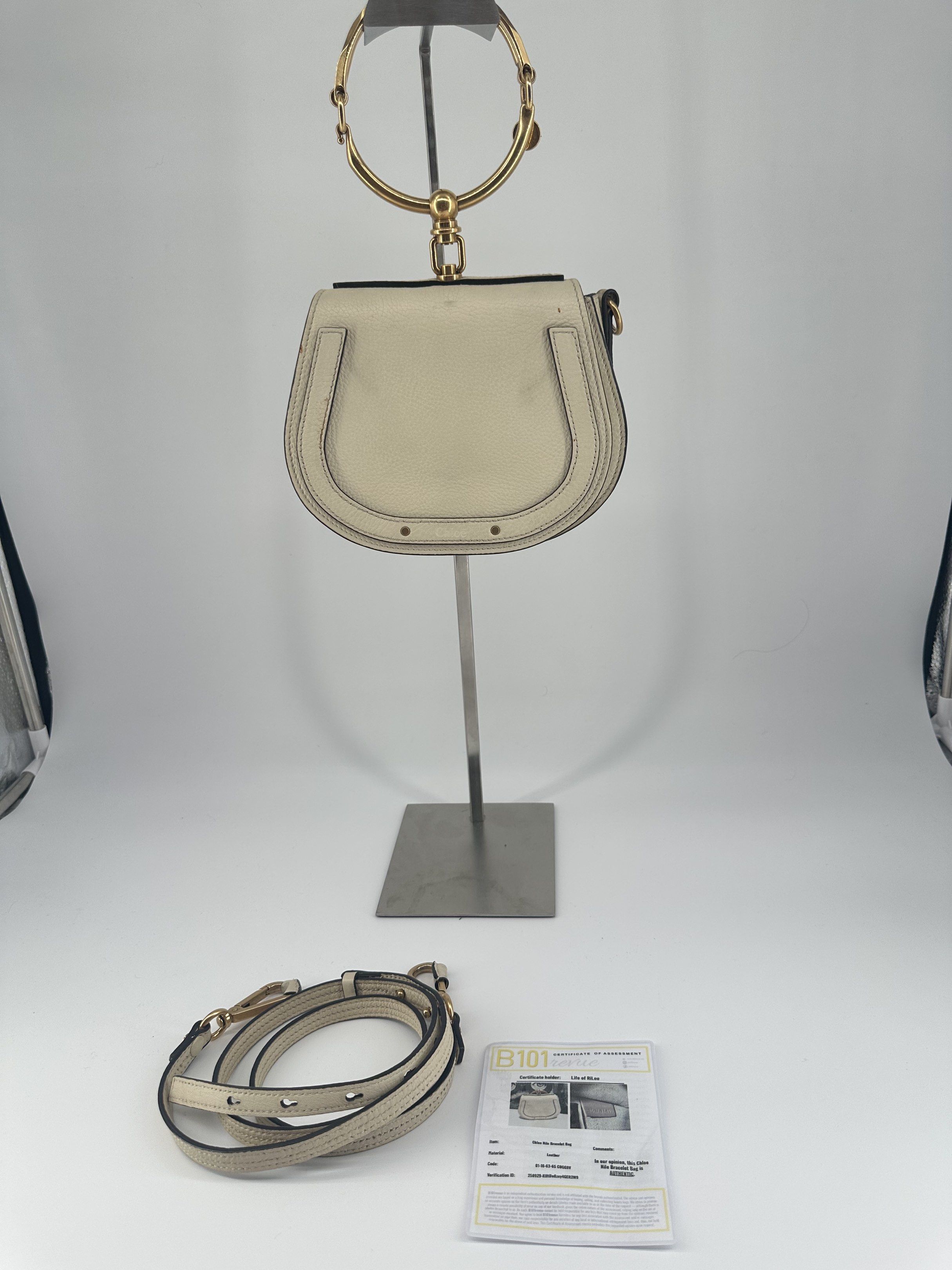Chloe Nile Bracelet Bag (Category: Luxury Bags & Wallets) located in Manila. Submitted by allthingsilove65 (Listing ID 1420560737, Image 1). Description: - Authentic Chloe Nile Bracelet Bag - Cream color - Gold-tone bracelet handle - Detachable shoulder strap - Includes dust bag and authenticity card - Stylish and iconic design -with Authenticity card.