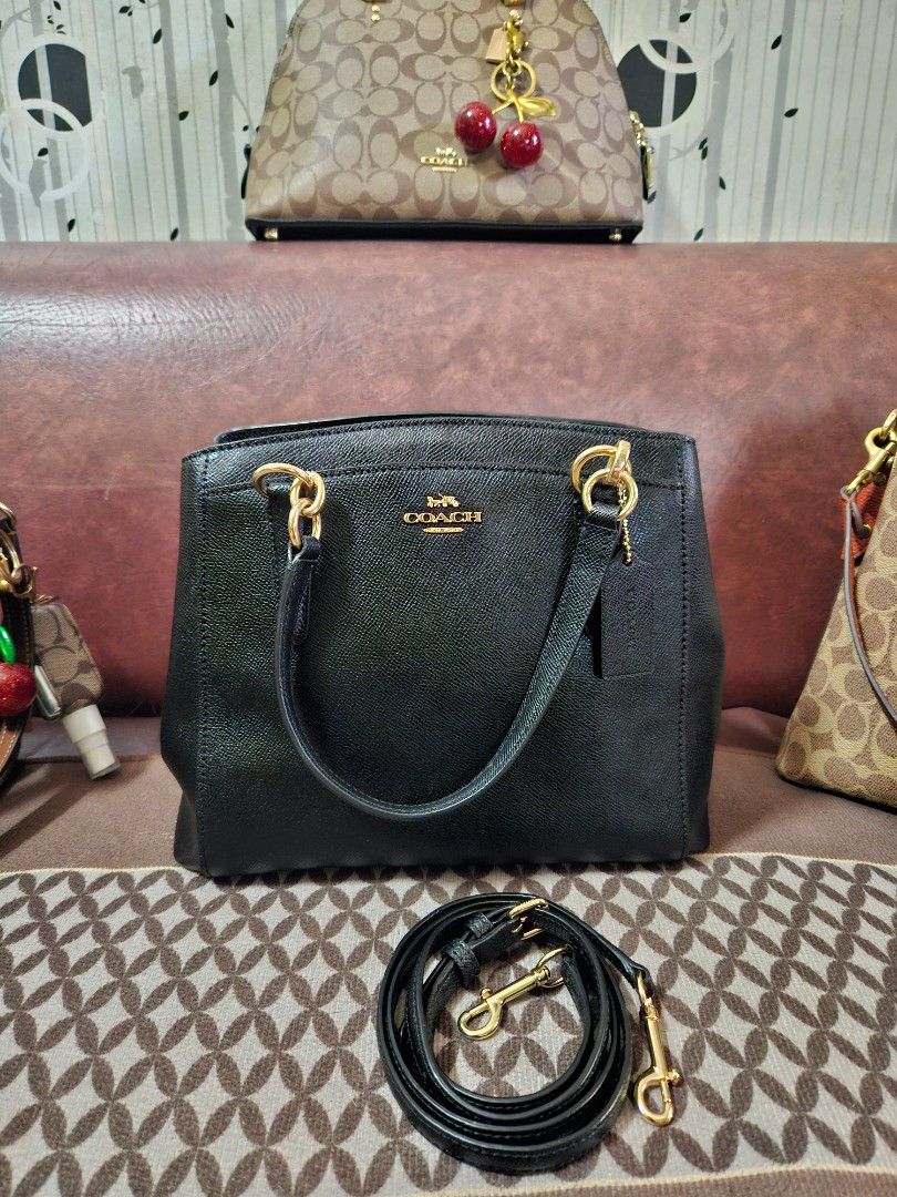 Coach Minetta - Black Satchel (Category: Luxury Bags & Wallets) located in Angono. Submitted by juleespreloved (Listing ID 1420589166, Image 1). Description: - Authentic Coach satchel handbag - Gold-tone hardware - Detachable shoulder strap - Interior zippered pocket - Top handle - Coach logo on front - Made of leather - Comes with OG hangtag.